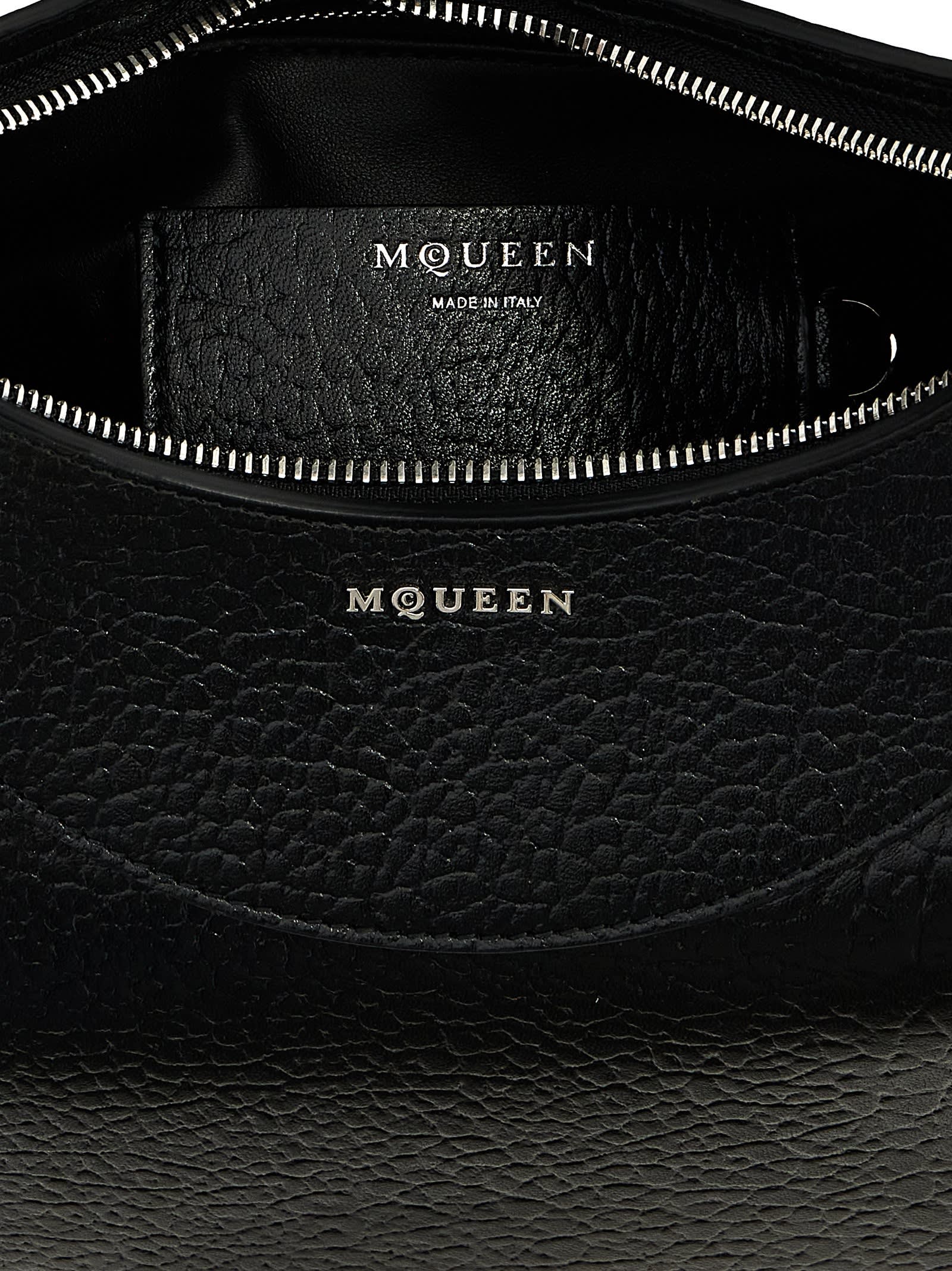 Shop Alexander Mcqueen Cross-bar Handbag In Black