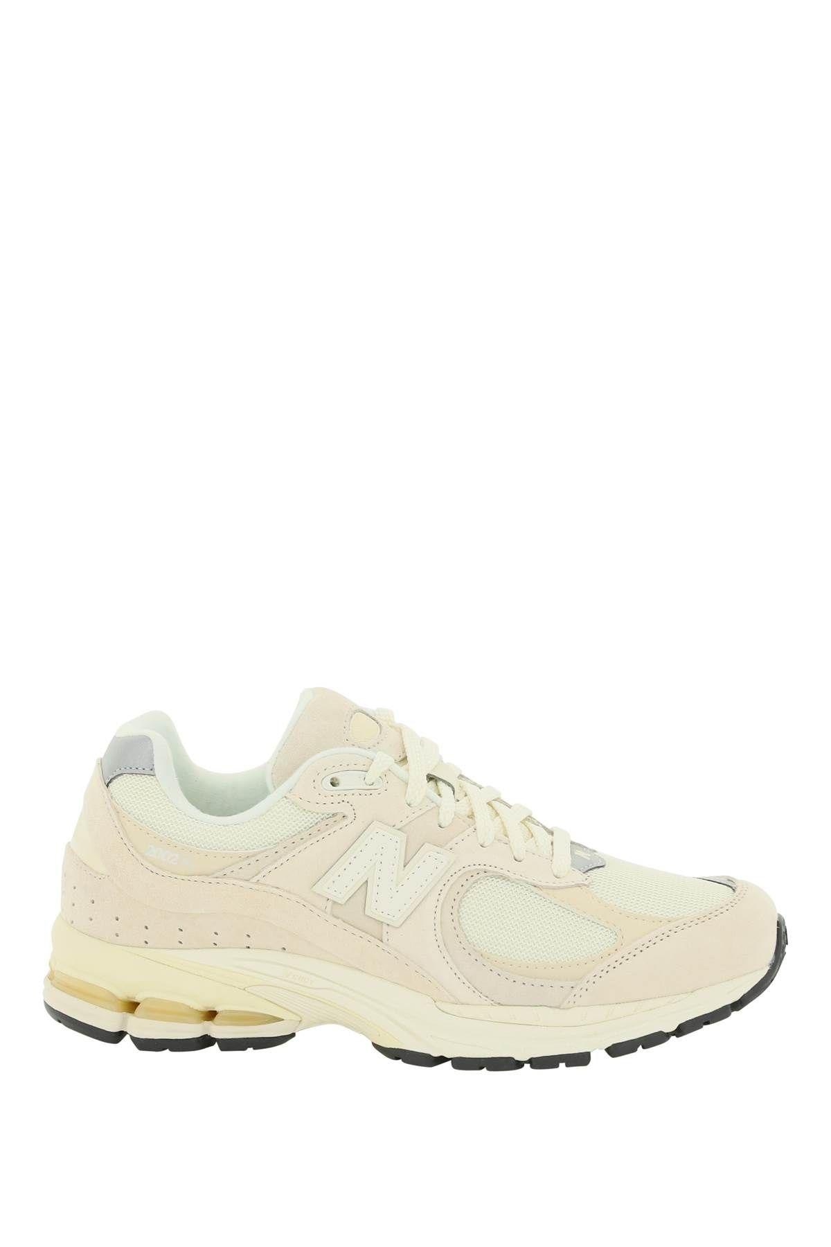 Shop New Balance Mesh Panel Logo Patched Sneakers
