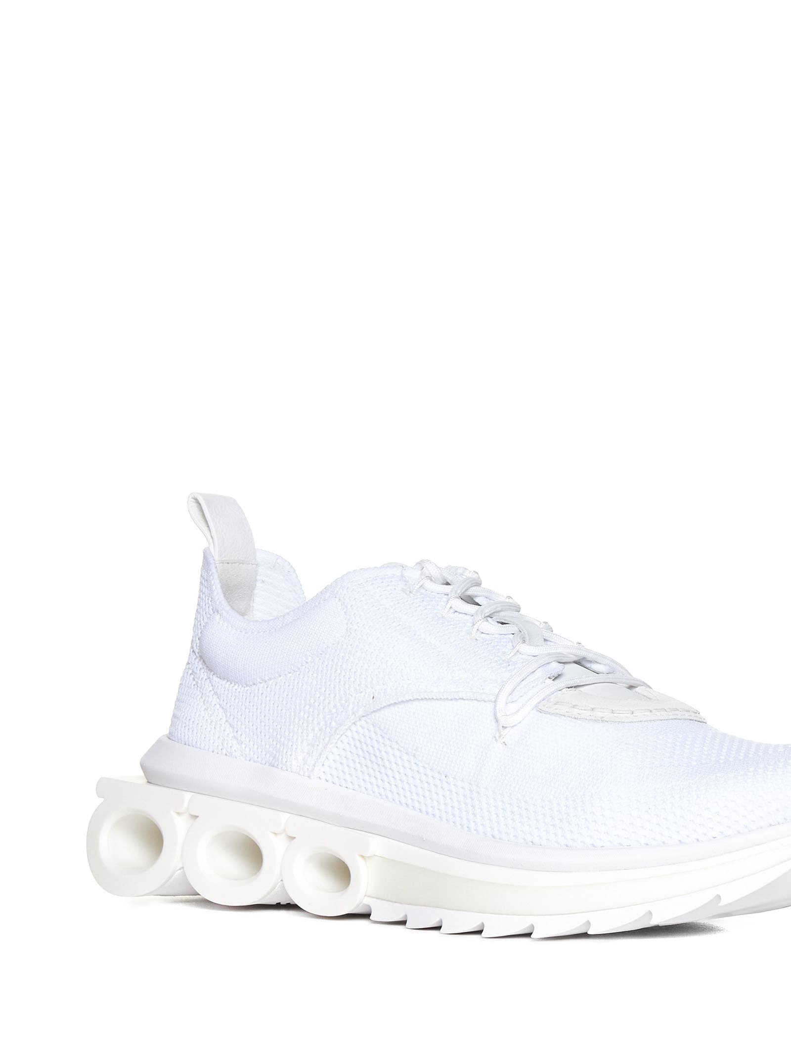 Shop Ferragamo Sneakers In White