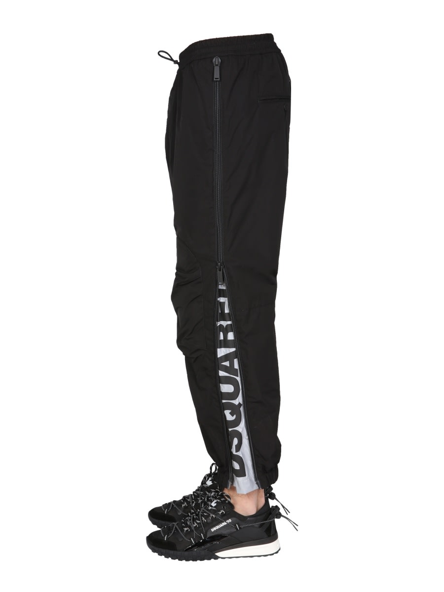 Shop Dsquared2 Trousers With Logo Print In Black