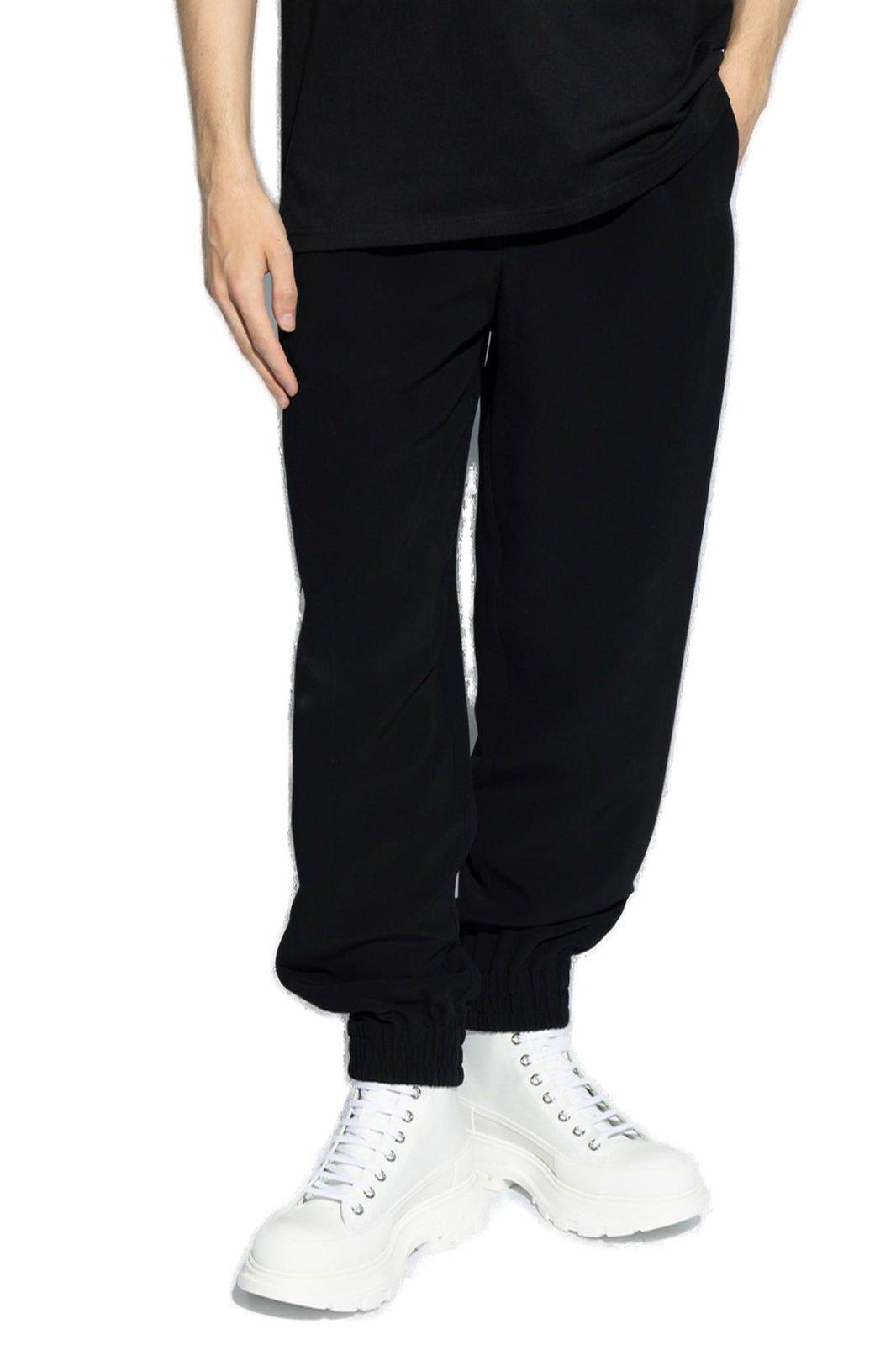 Shop Alexander Mcqueen Elastic Waist Trousers In Black / Ivory