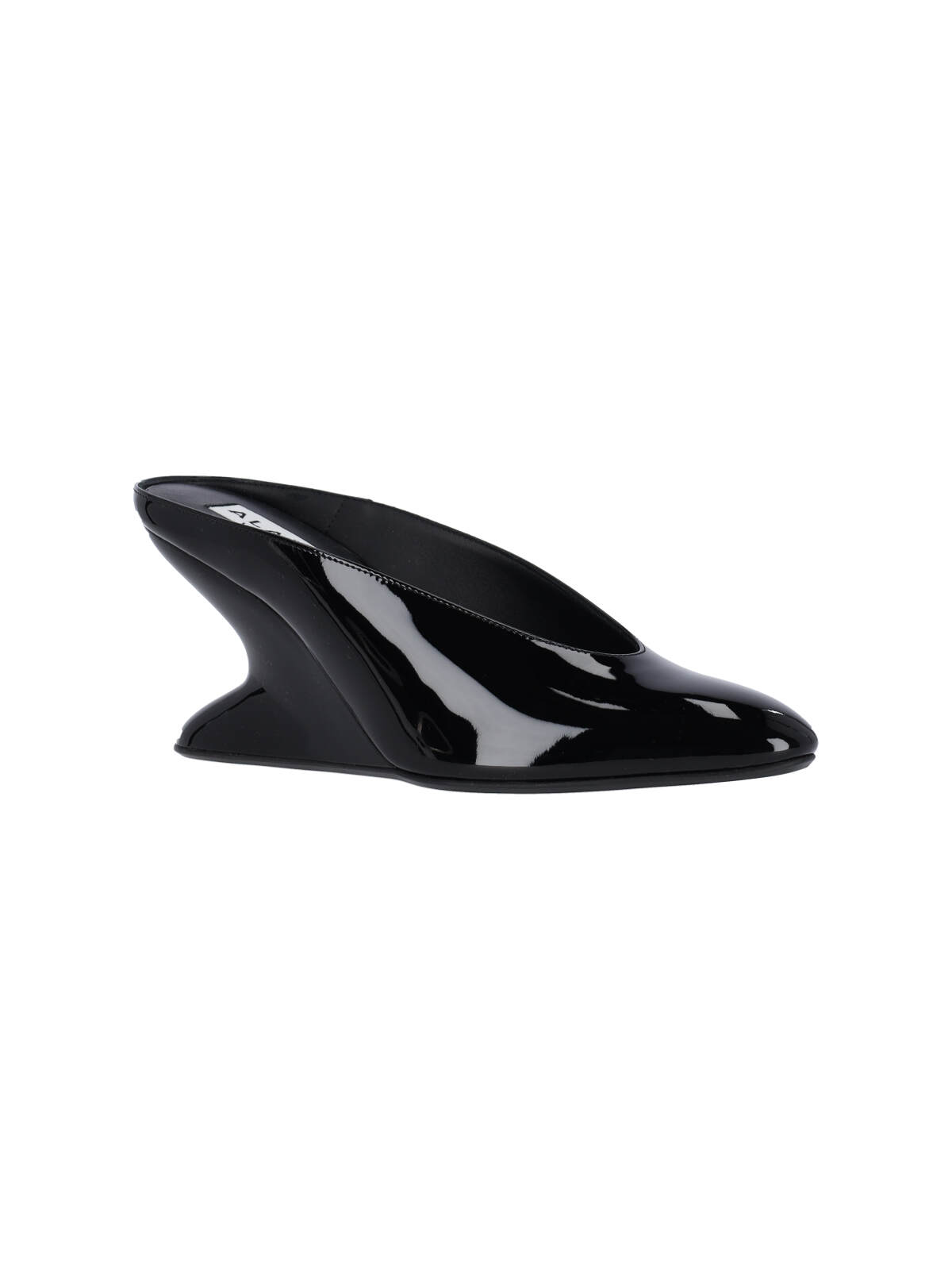 Shop Alaïa Mules With Curved Wedges