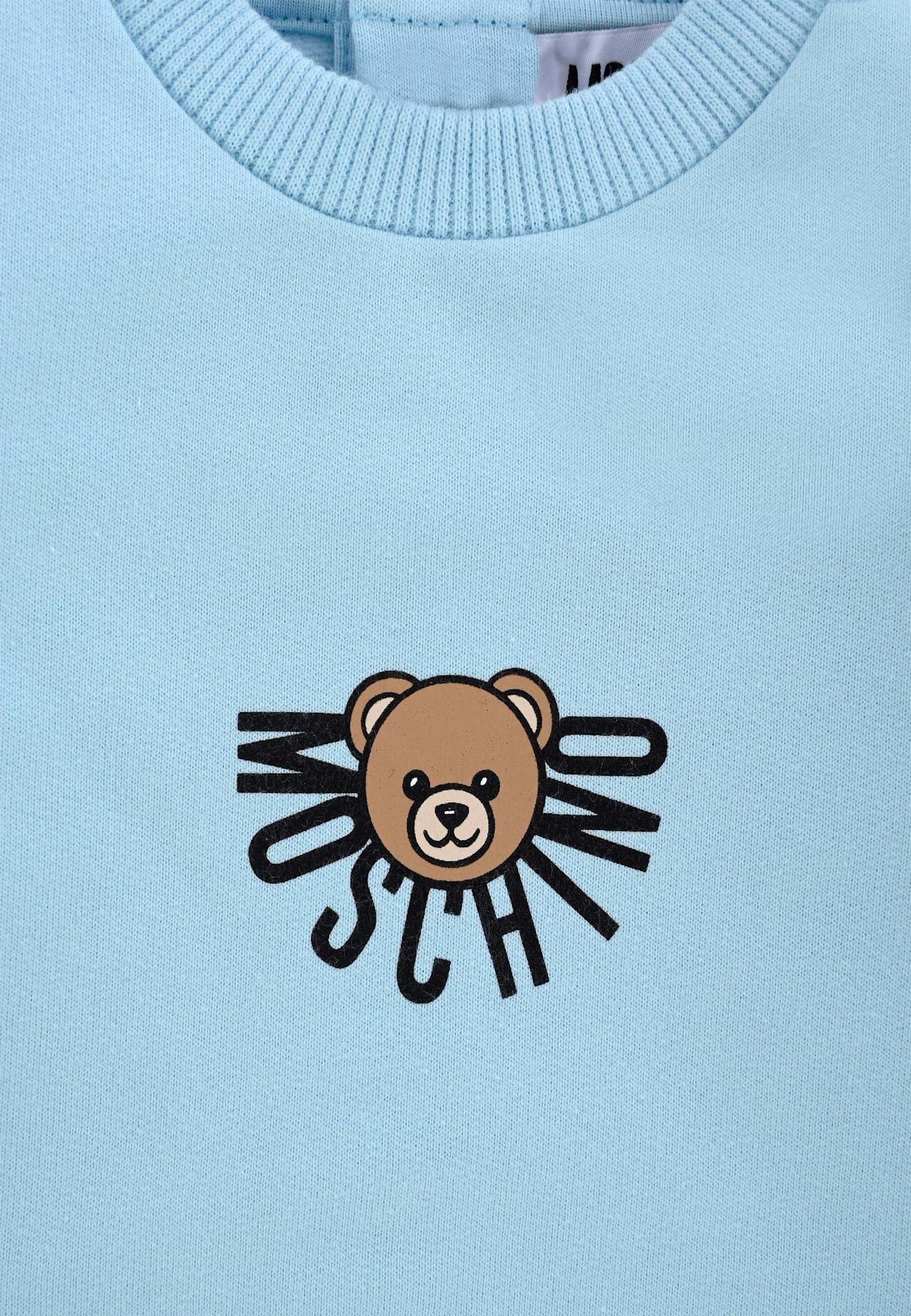 Moschino Light Blue Babygrow For Baby Boy With Teddy Bear In Blue