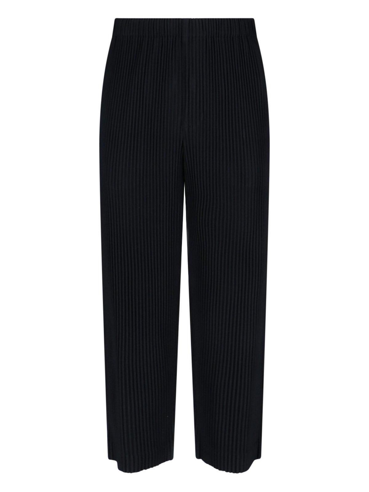 ISSEY MIYAKE PLEATED TAPERED LEG TROUSERS