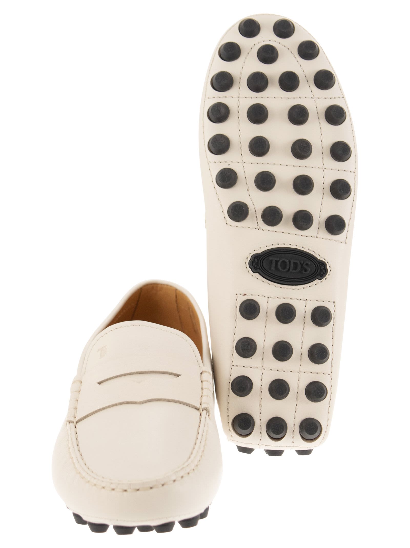 Shop Tod's Gommino Loafers In Cream