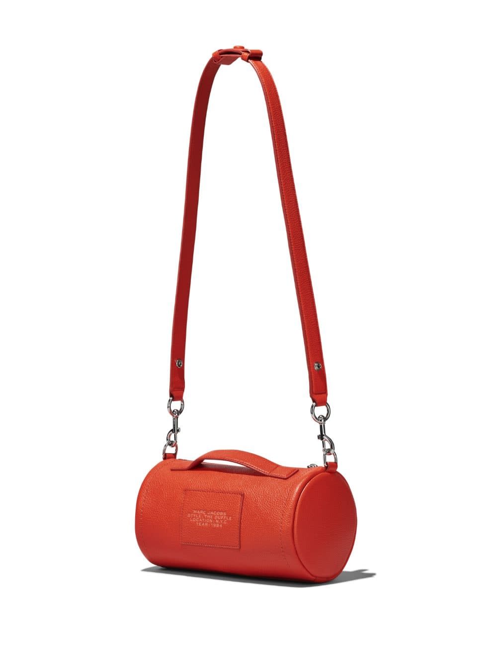 Shop Marc Jacobs The Leather Duffle Bag In Electric Orange