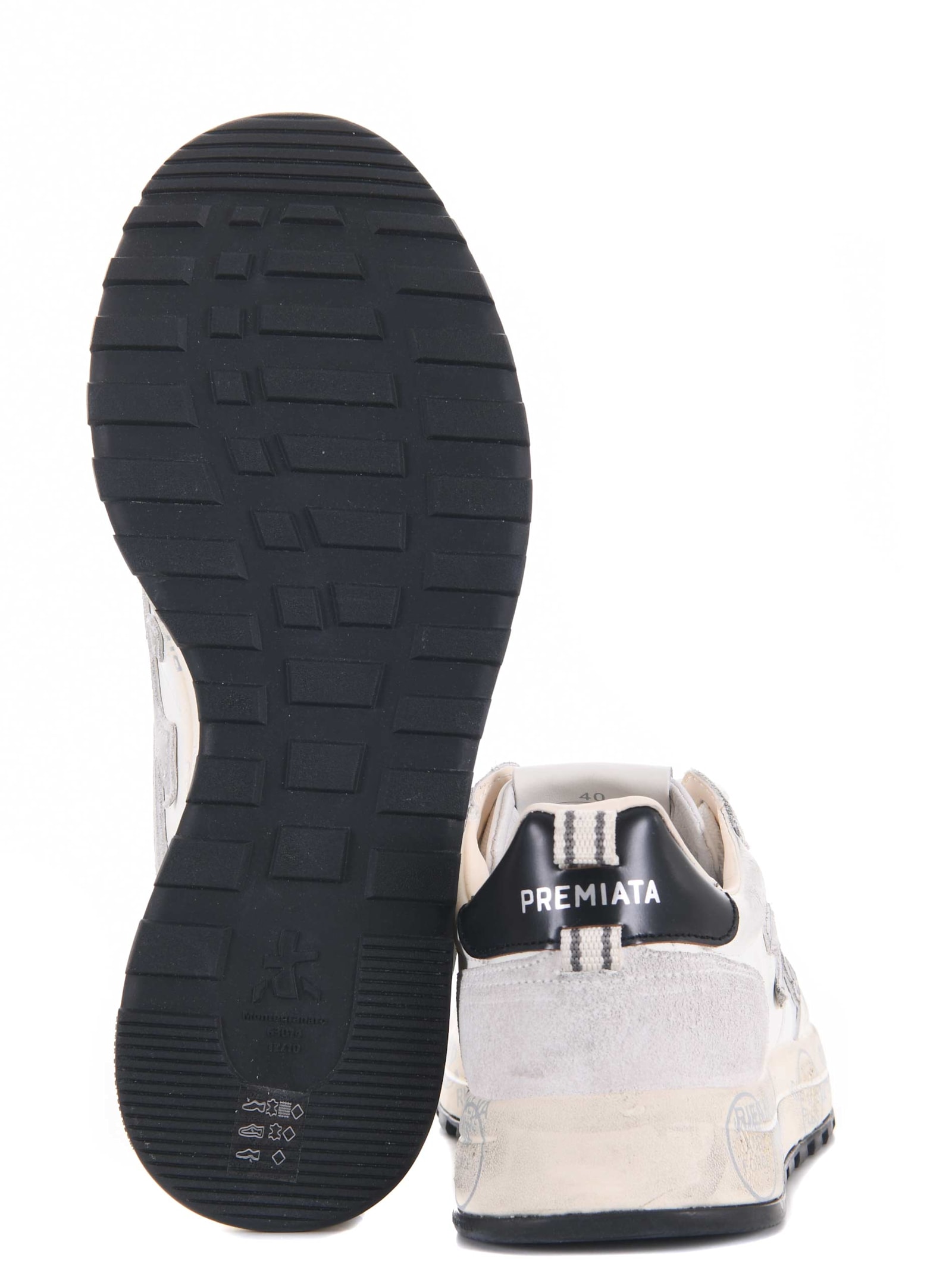 Shop Premiata Sneakers In White