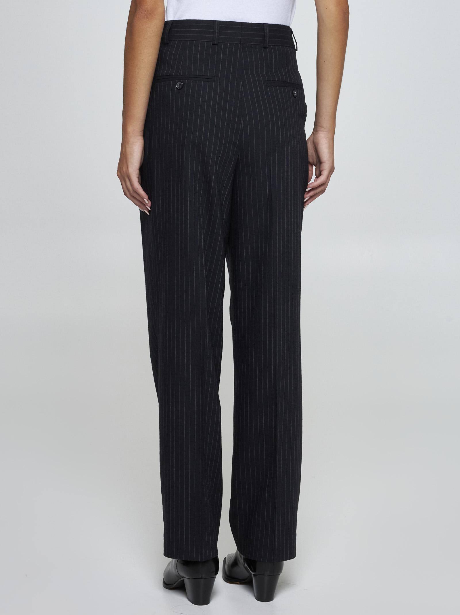 Shop Totême Pinstriped Wool-blend Trousers In Blue