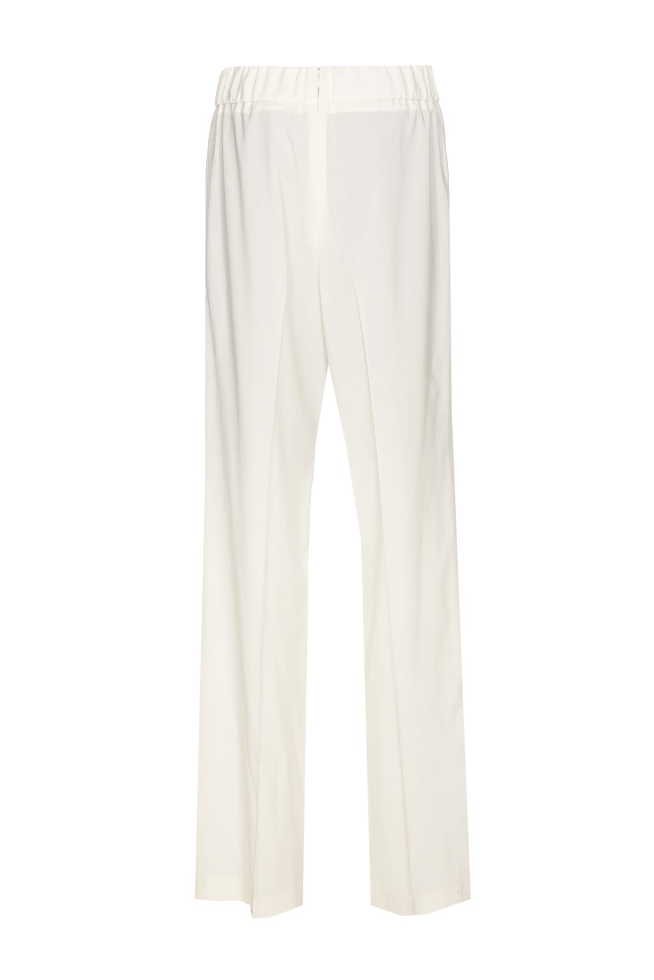 Shop Dolce & Gabbana Flare Trousers With Logo Plaque In White