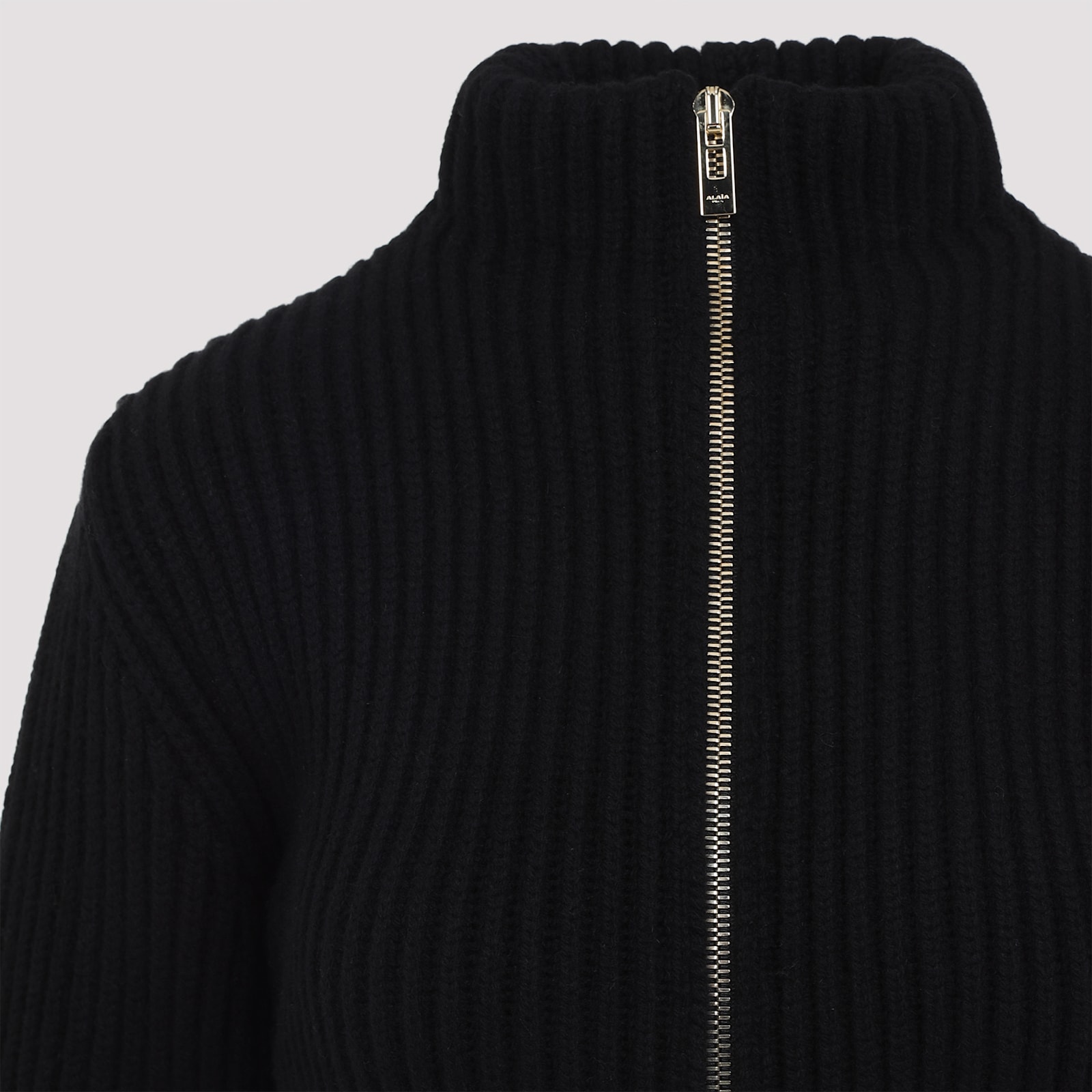 Alaïa Ribbed Wool And Cashmere-blend Peplum Cardigan In Noir Alaia