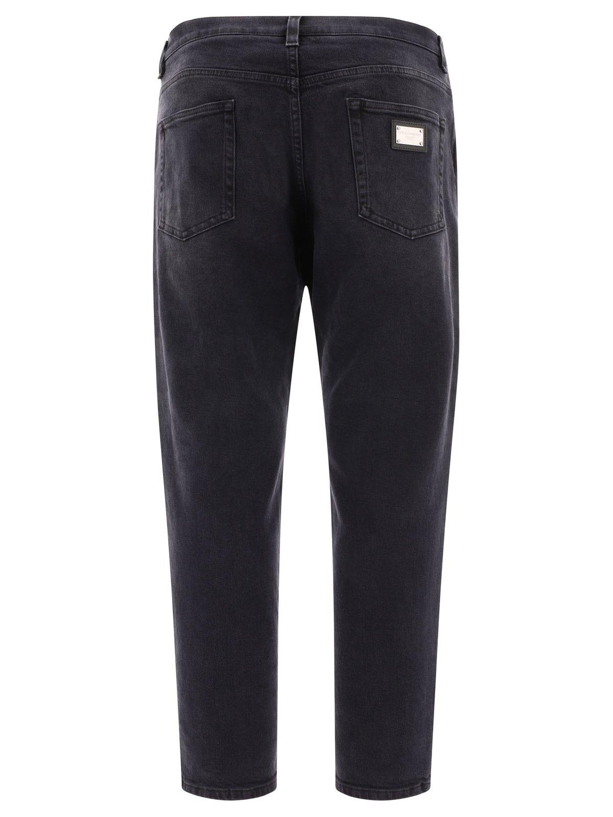 Dolce & Gabbana Logo Plaque Tapered Leg Jeans In Blue