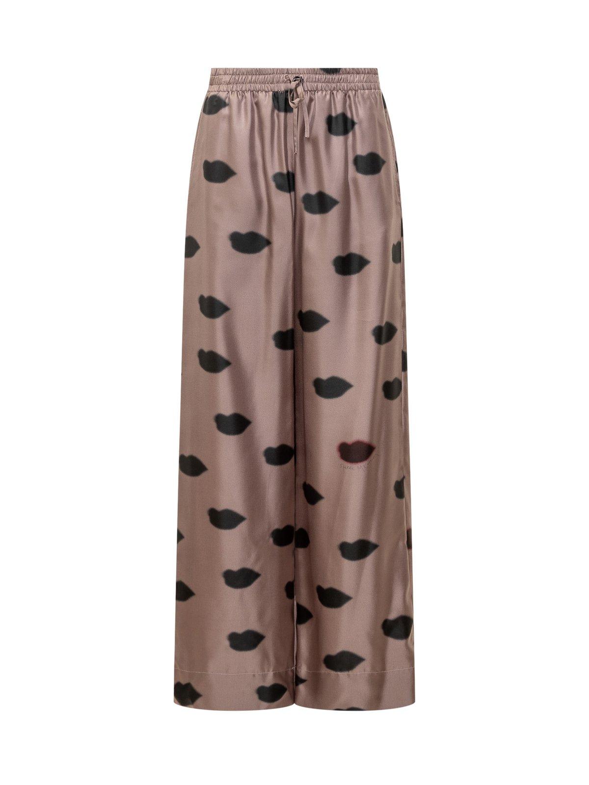 Shop Stella Mccartney Oversized Lips Printed Trousers In Light Taupe