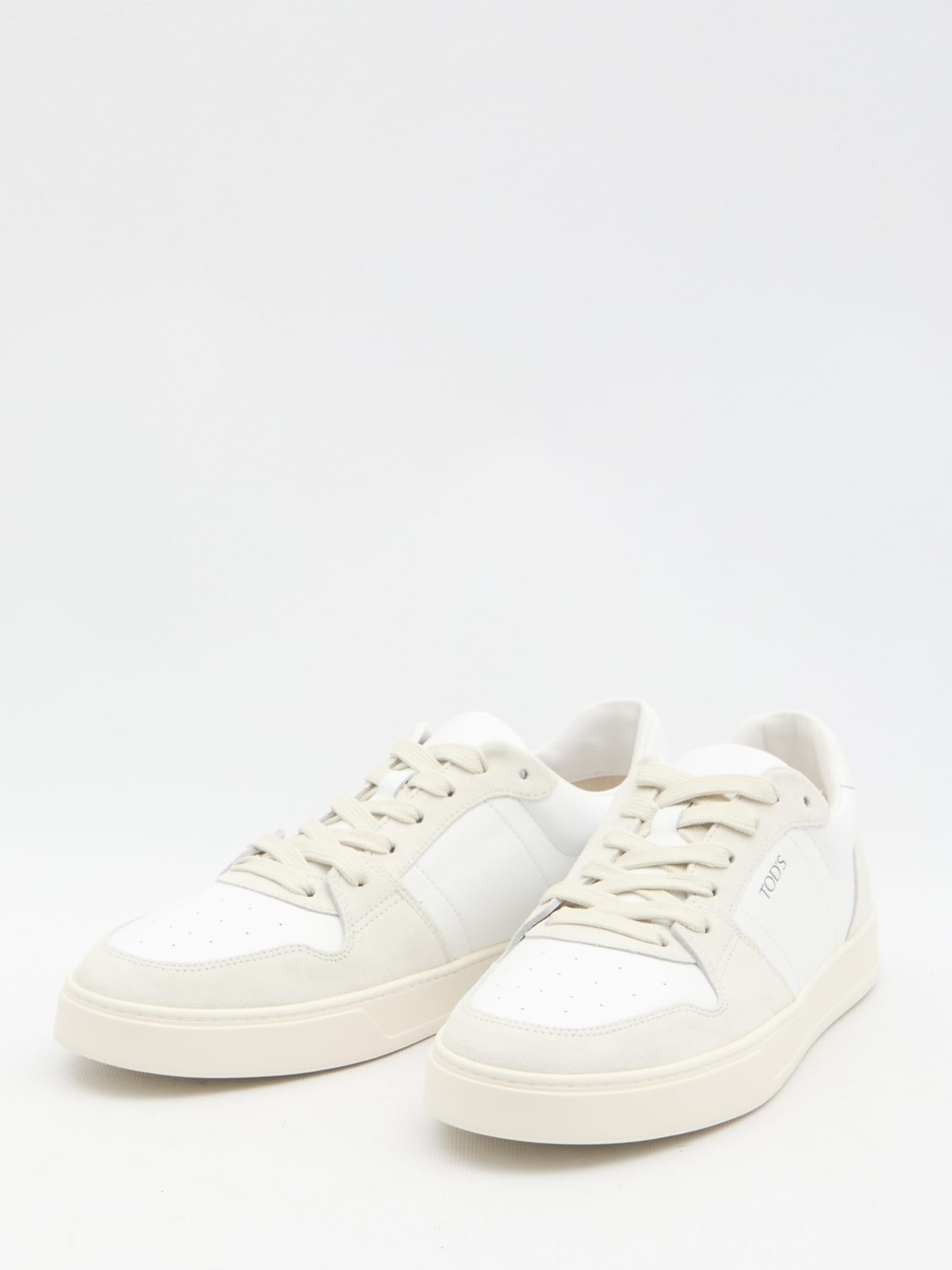 Shop Tod's Leather Sneakers In White