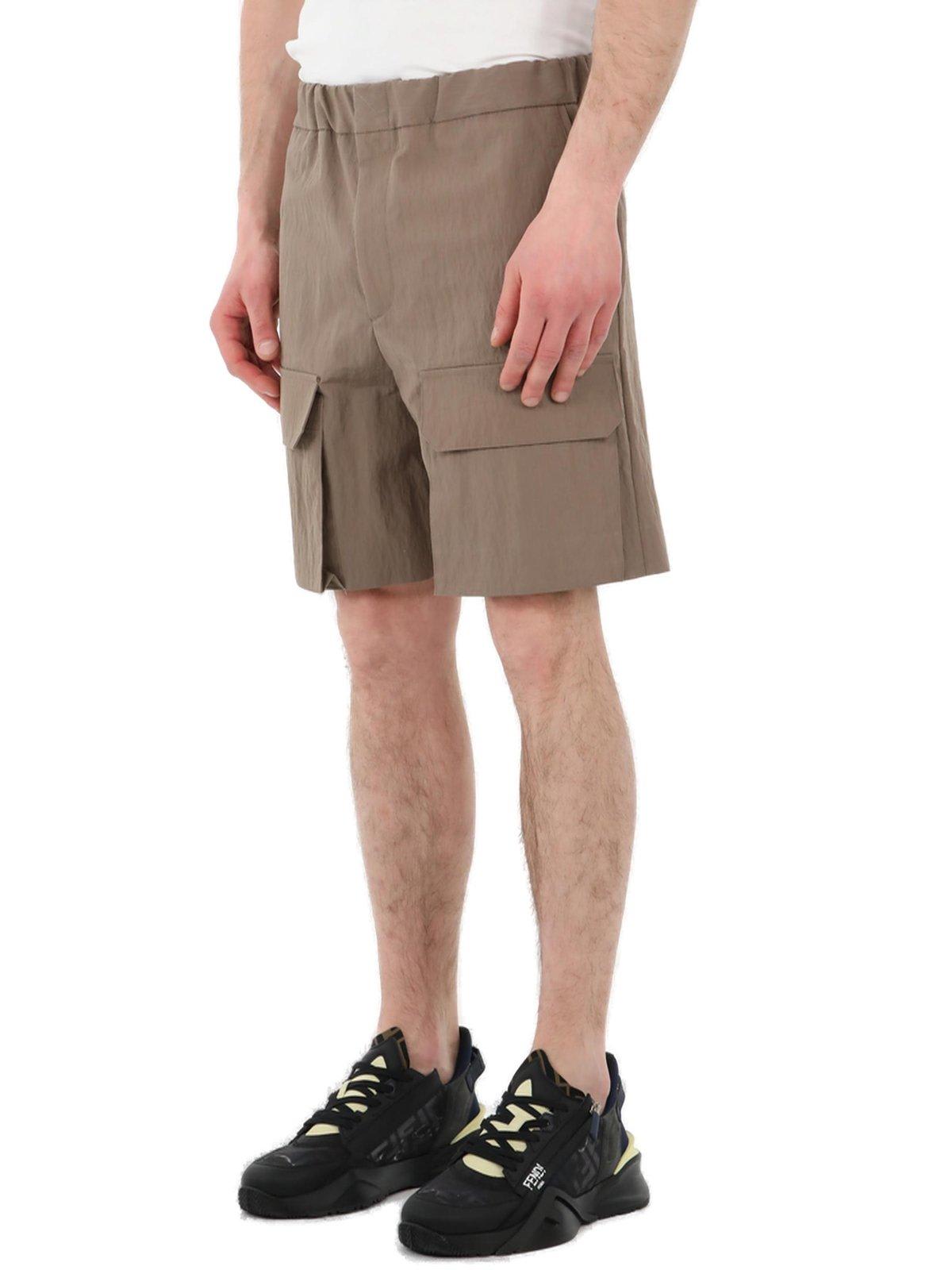 Shop Fendi Logo Embroidered Shorts In Brown