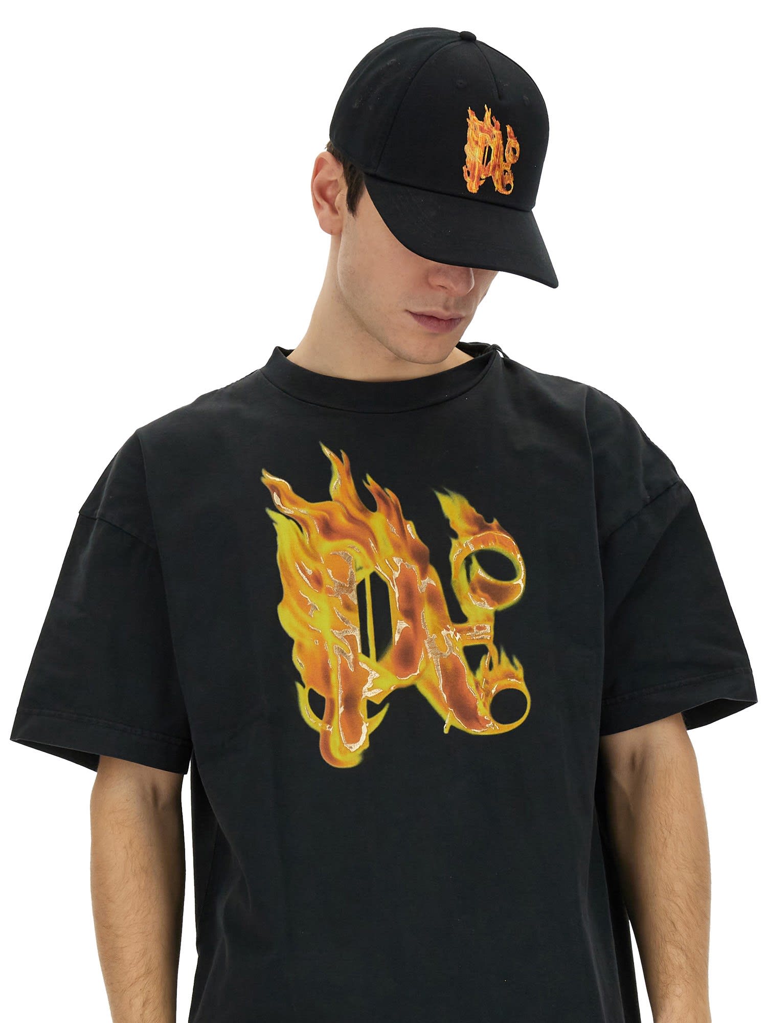Shop Palm Angels T-shirt With Burning Monogram Print In Black/gold