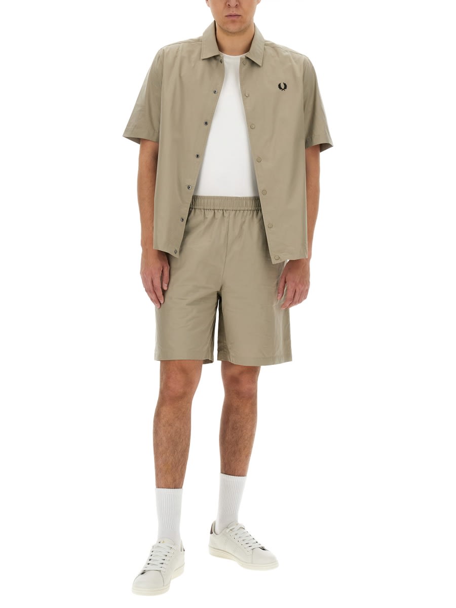 Shop Fred Perry Cotton Bermuda Shorts In Beige