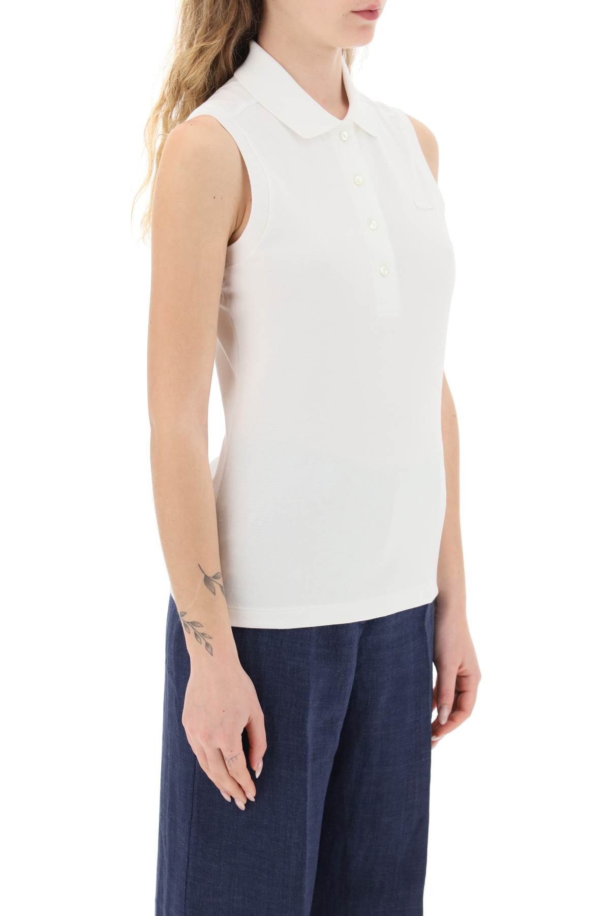 Shop Lacoste Sleeveless Polo Shirt In White (white)