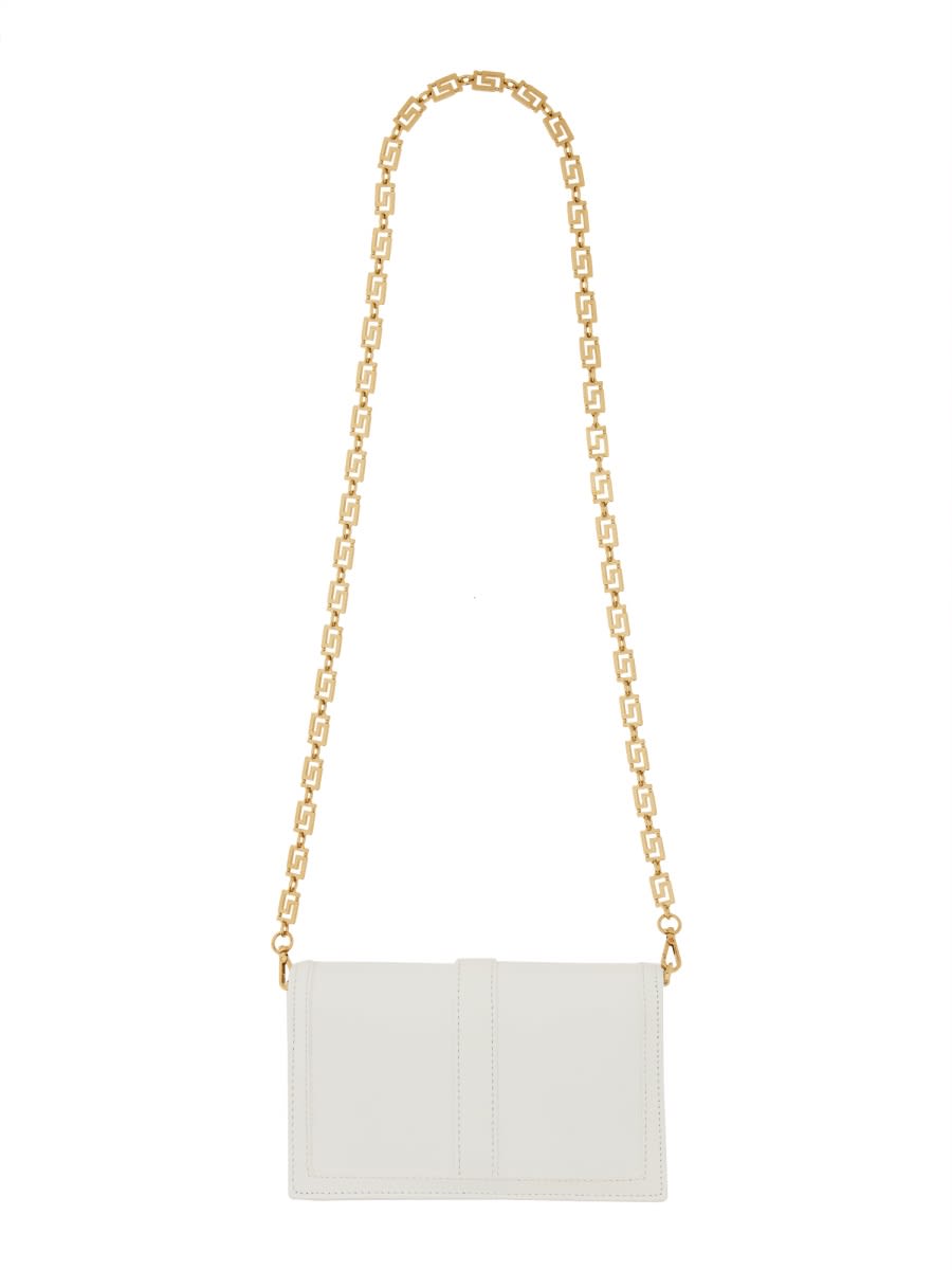 Shop Versace Mini Greca Goddess Bag In White