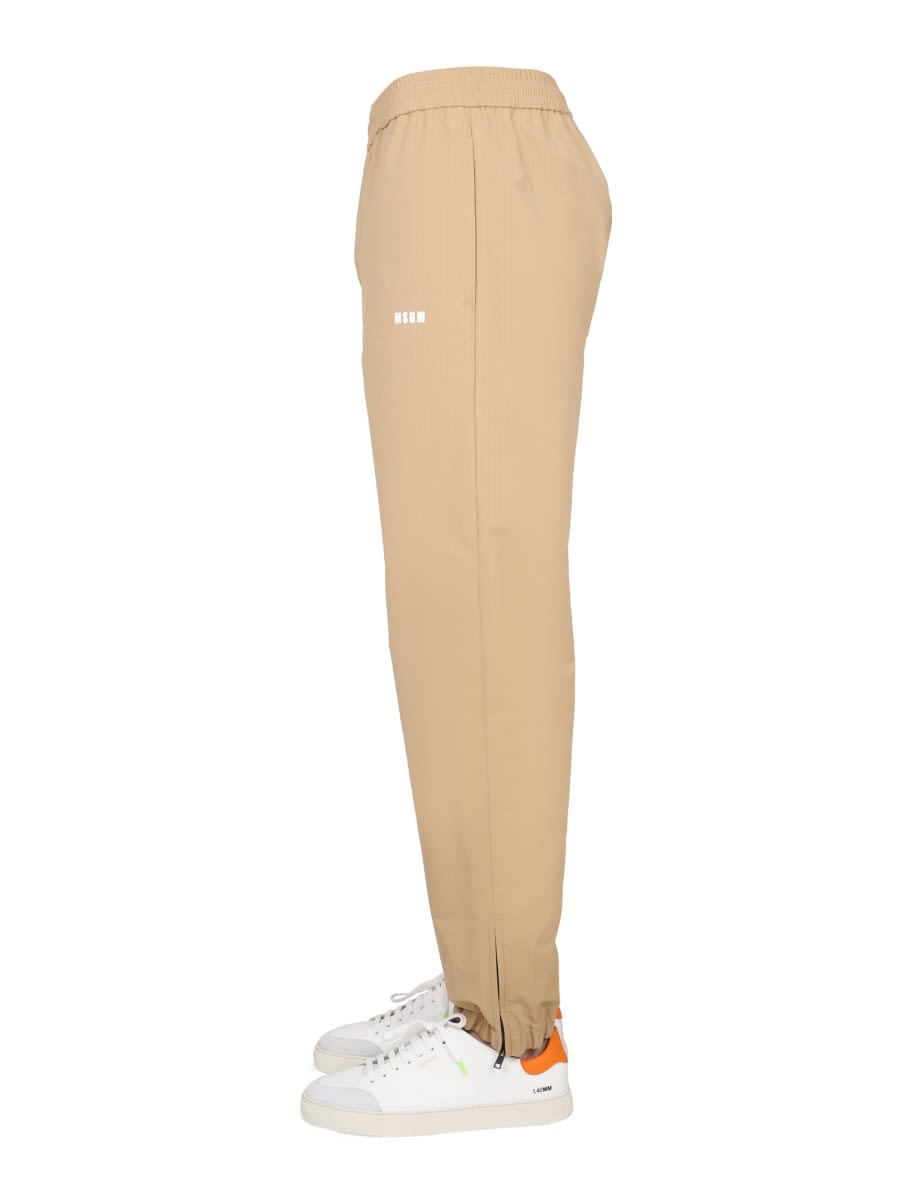 Msgm Logo-print Elasticated Waist Trousers In Beige