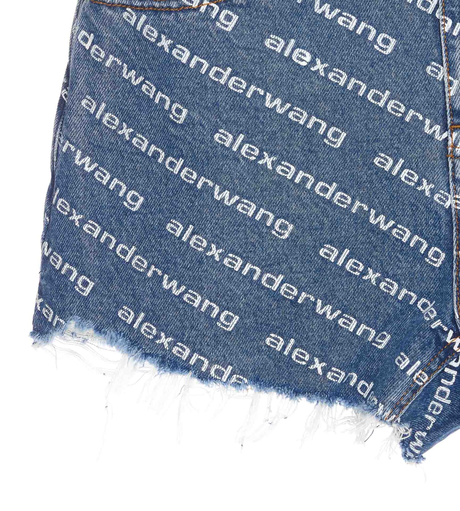Shop Alexander Wang Bite All Over Logo Denim Shorts In Blue
