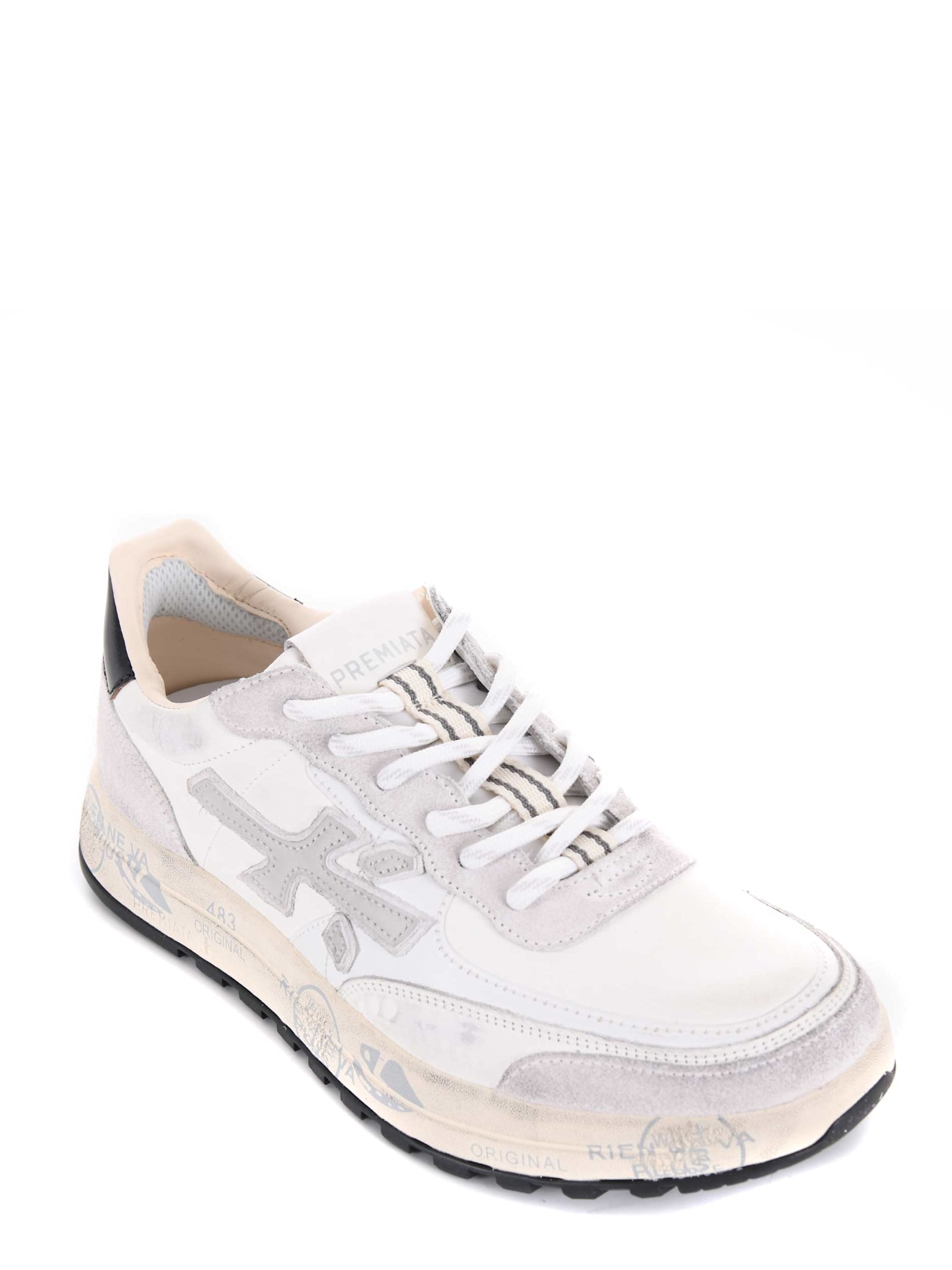 Shop Premiata Sneakers In White