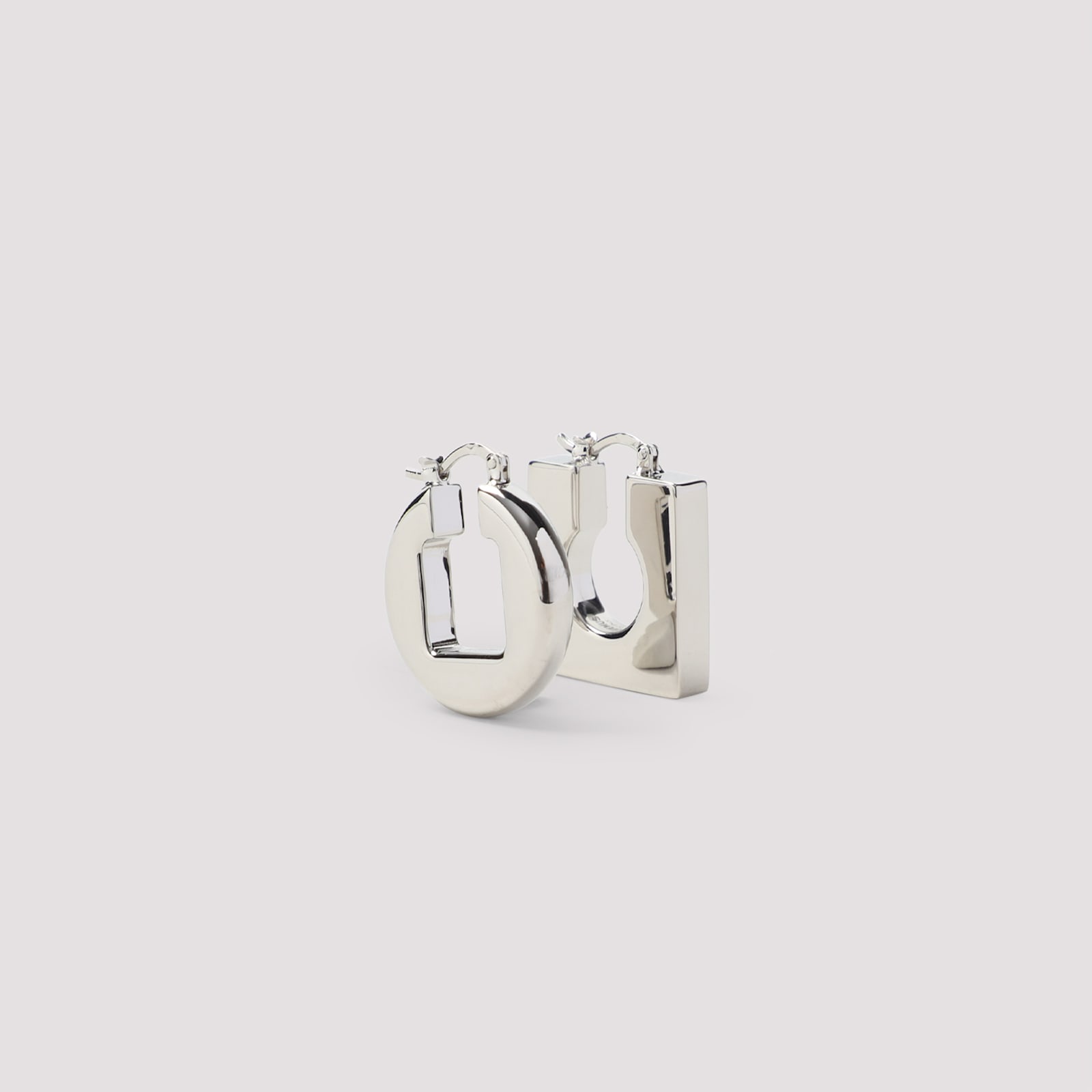 Jacquemus Asymmetric Geometric Earrings In Polished Plated Brass In Metallic