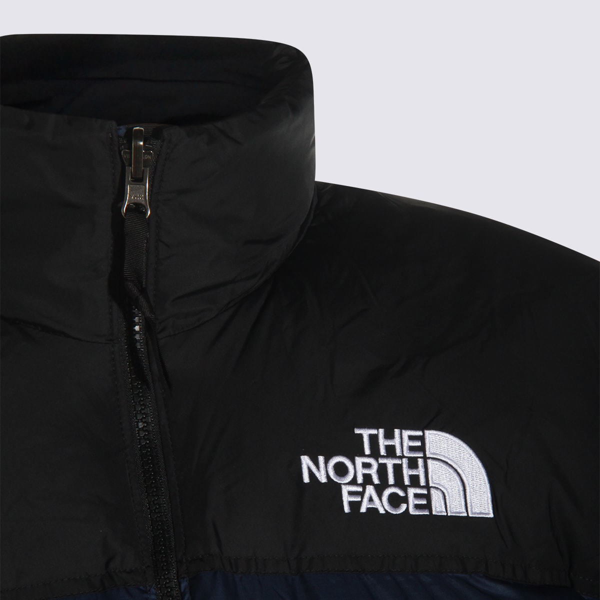 The North Face Blue Down Jacket In Blue