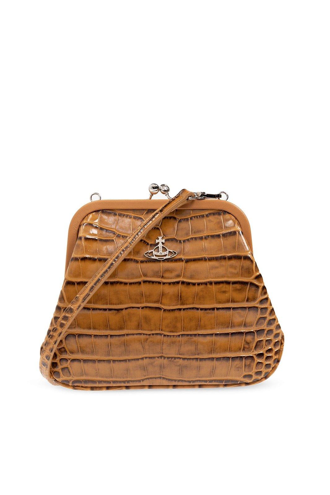 Shop Vivienne Westwood Embossed Viviennes Clutch Bag In Tan