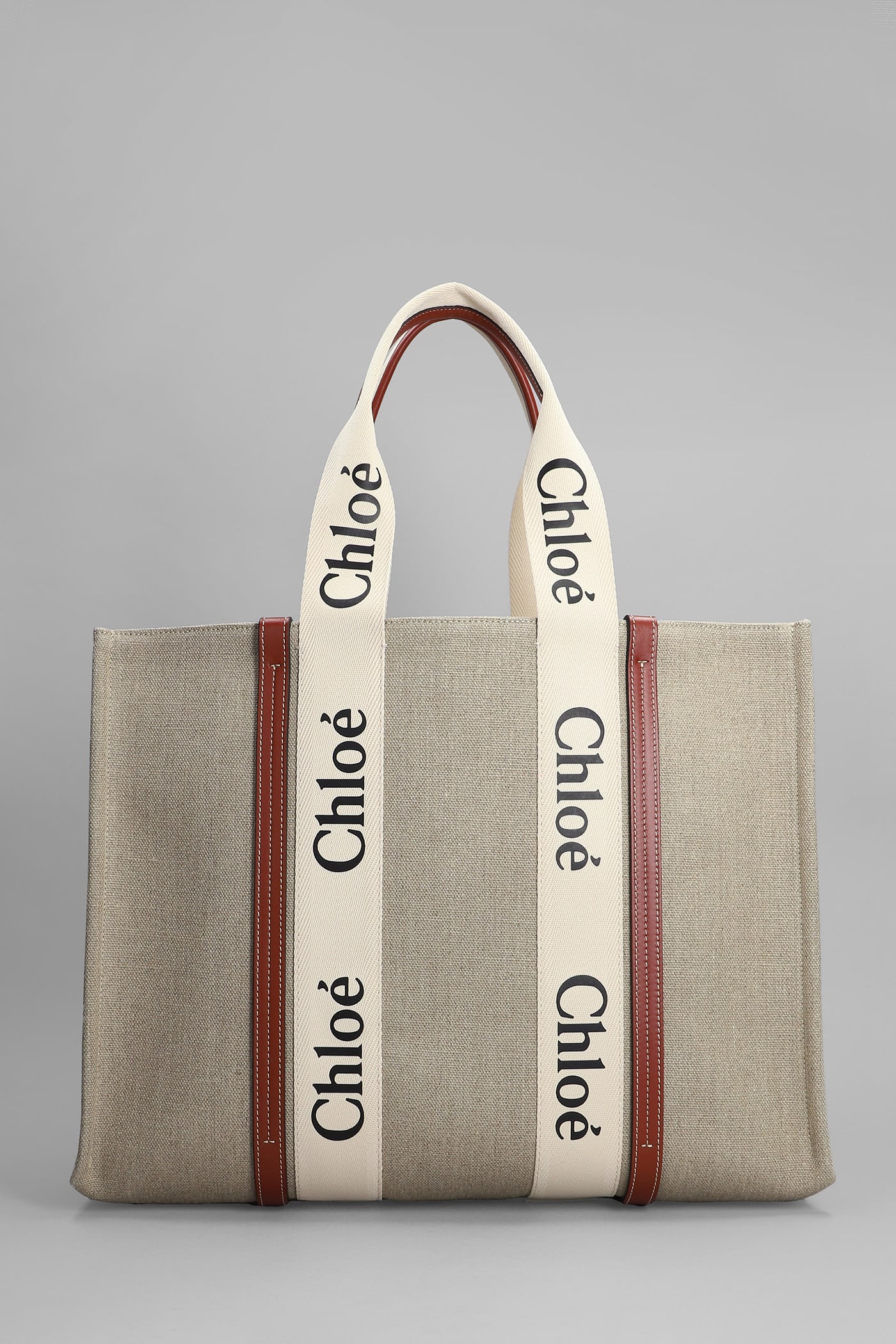 Shop Chloé Large Woody Tote In White Canvas