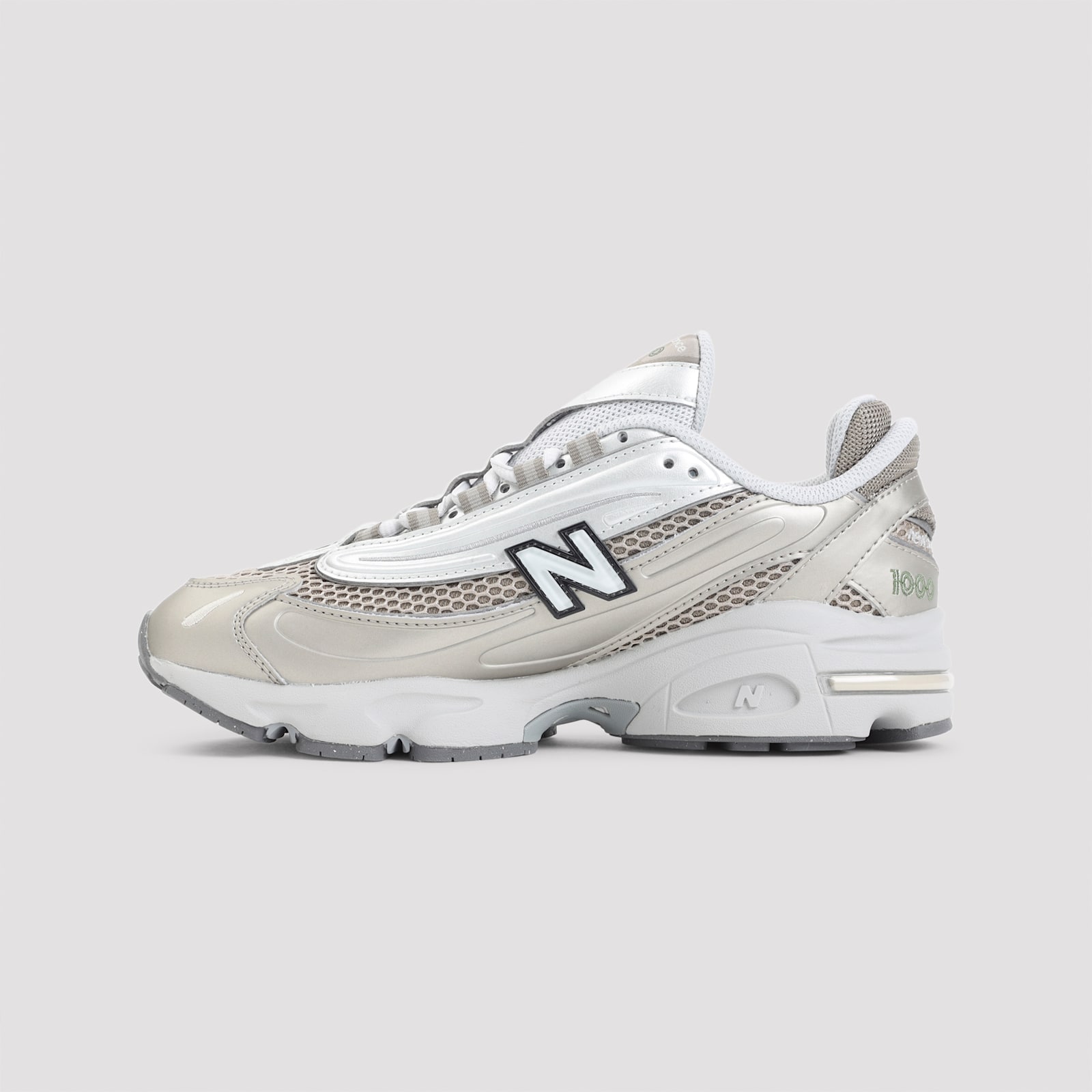 New Balance Contemporary Sneakers Featuring Mesh Panels And Reflective Accents In White