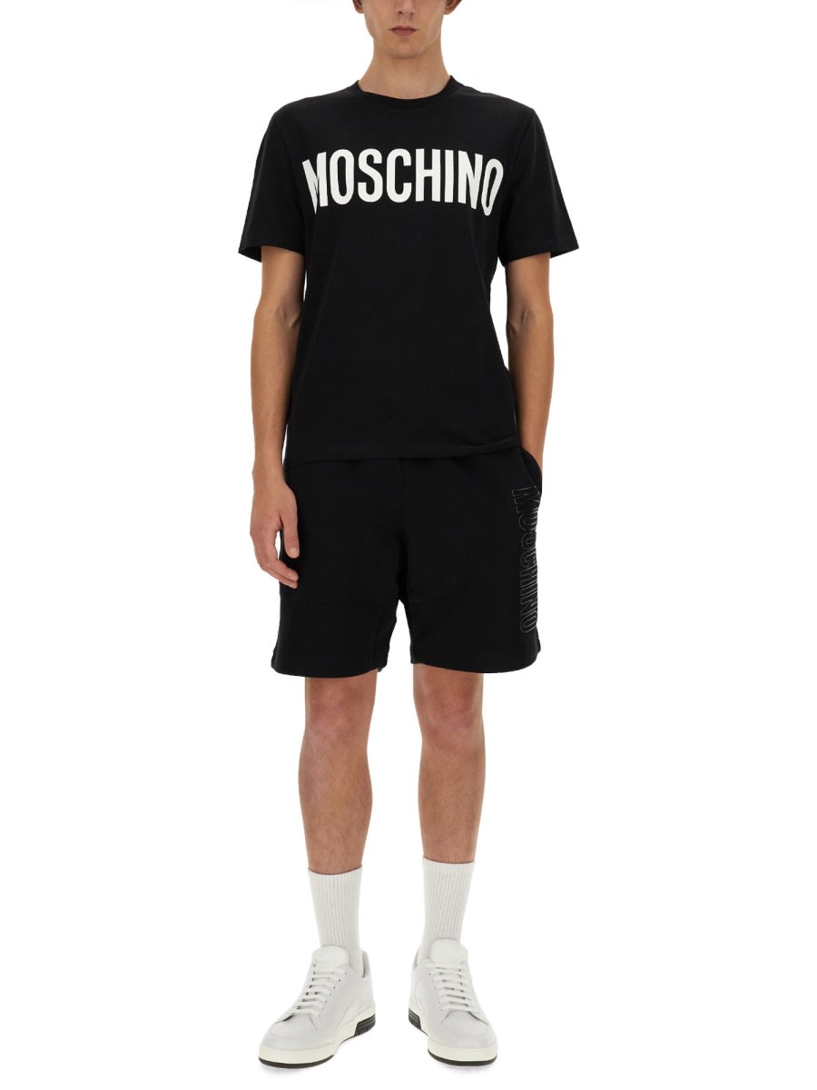 Shop Moschino Cotton Bermuda Shorts In Black