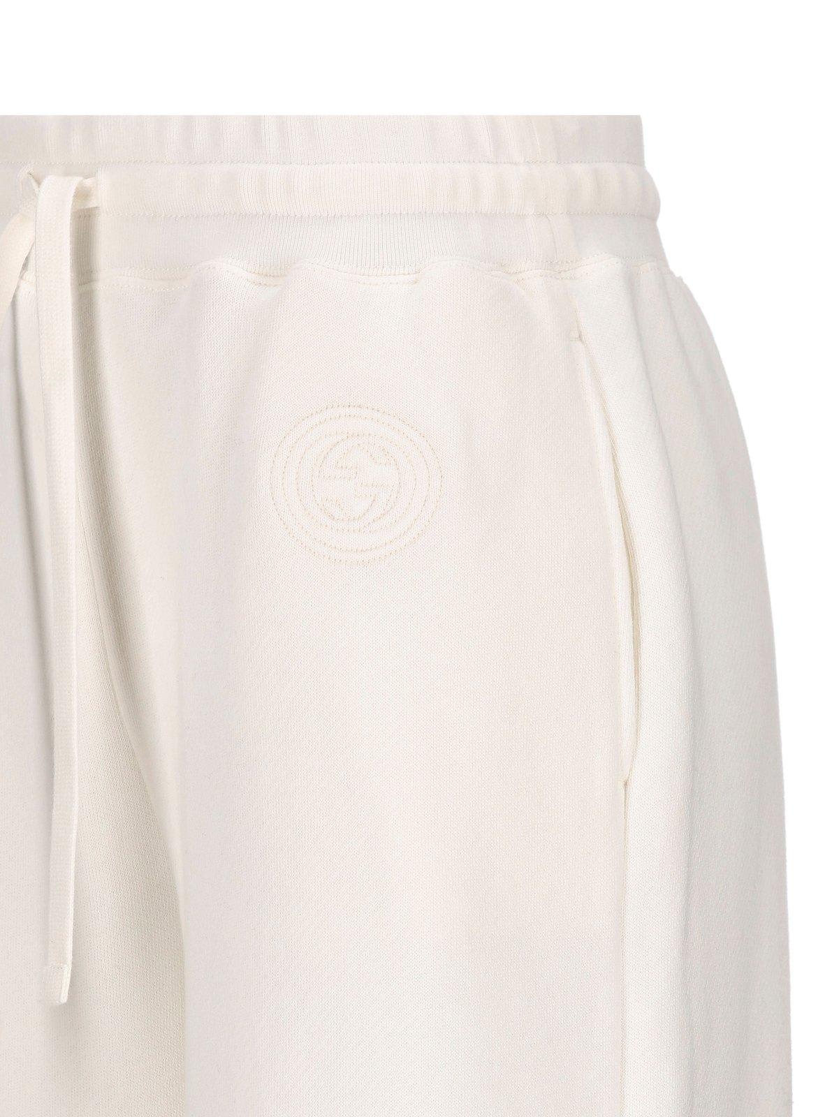 Shop Gucci Interlocking G Embroidered Jersey Trousers In White