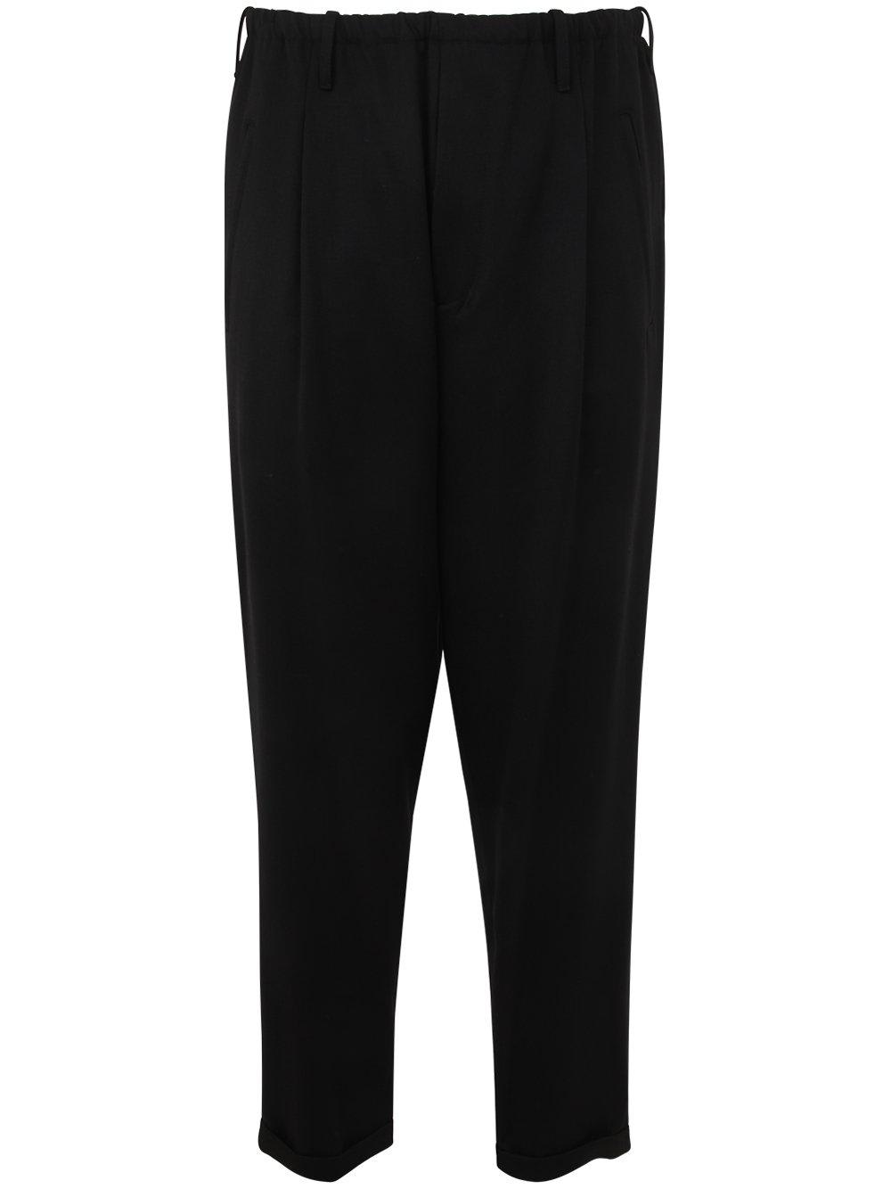 Shop Magliano Low-rise Wide-leg Trousers In Black