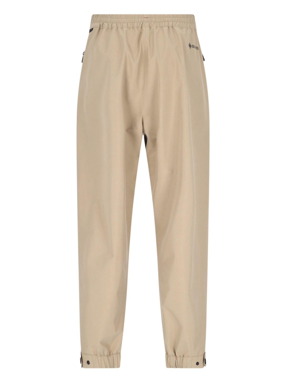 Shop Moncler Logo Track Pants In Beige