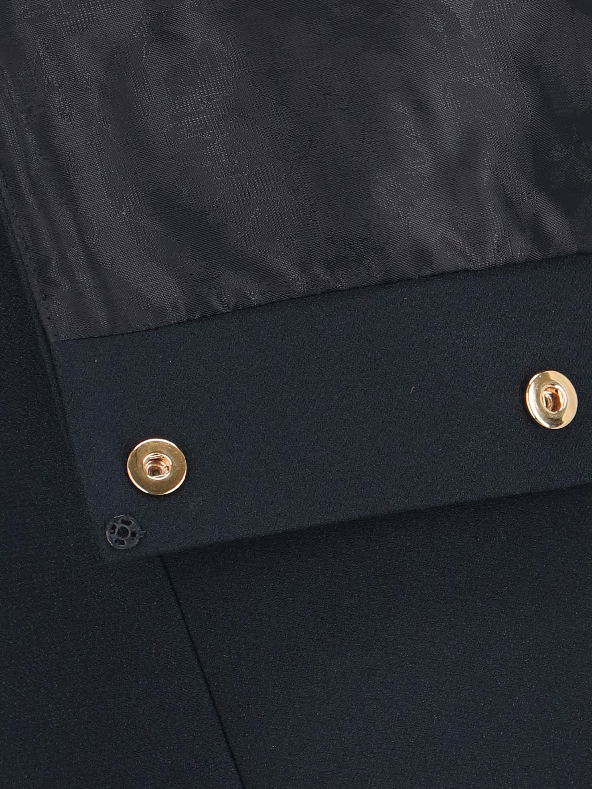 Shop Versace Mini Button Skirt In Black