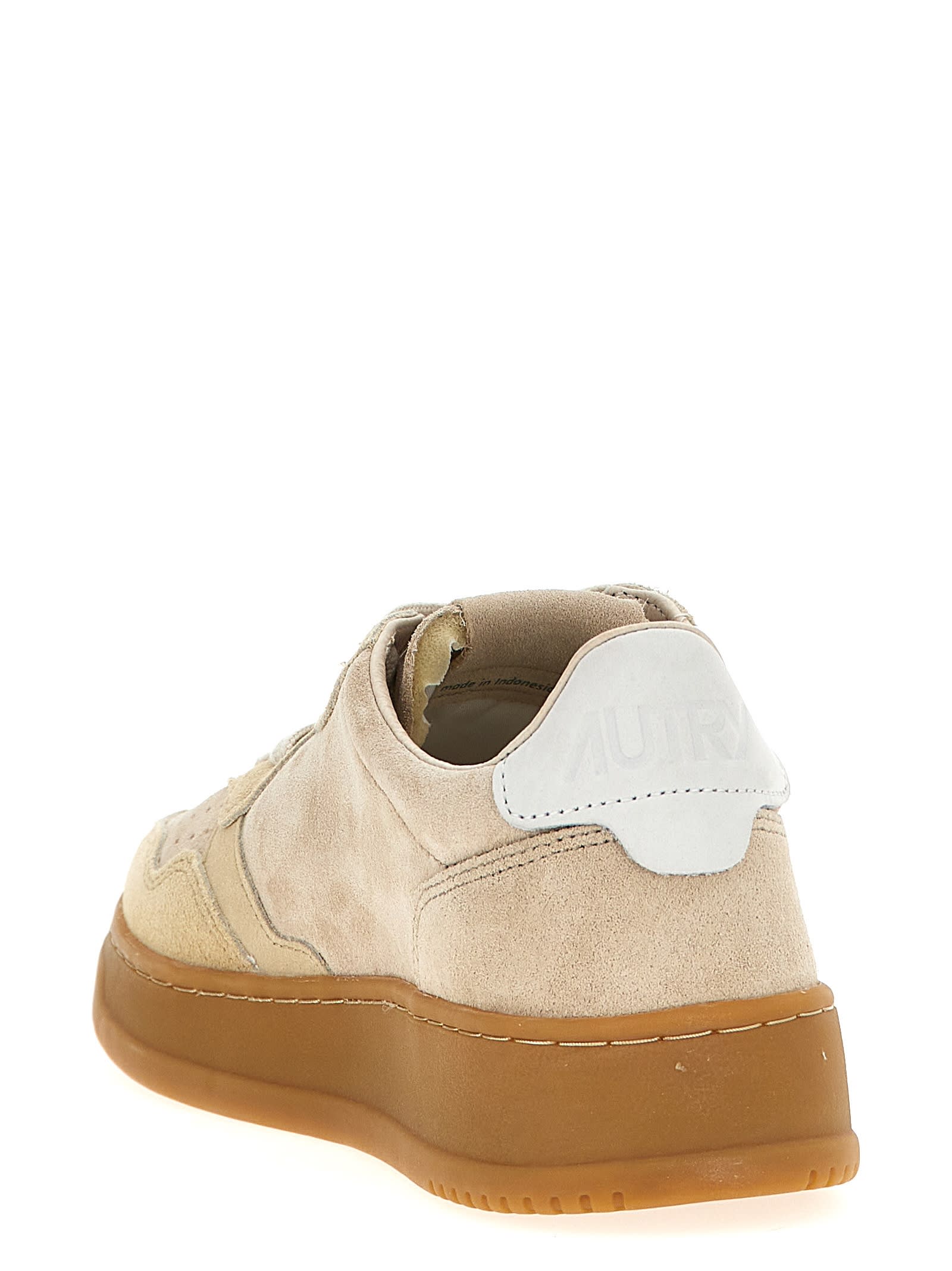 Shop Autry Medalist Low Sneakers In Beige