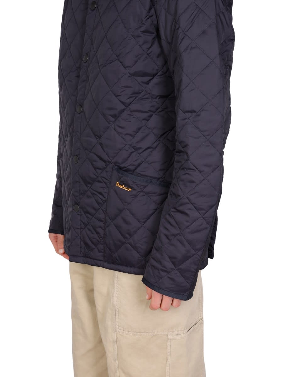 Barbour Heritage Liddesdale Blue Jacket With Classic Corduroy Collar And Logo Lettering On The Front In Tech In Blue