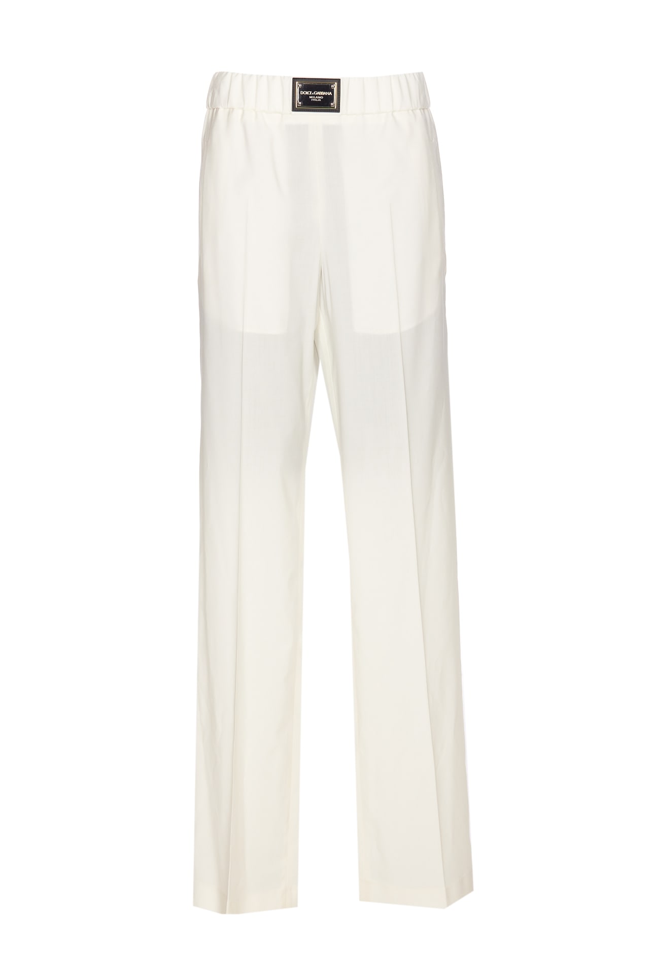Shop Dolce & Gabbana Flare Trousers With Logo Plaque In White