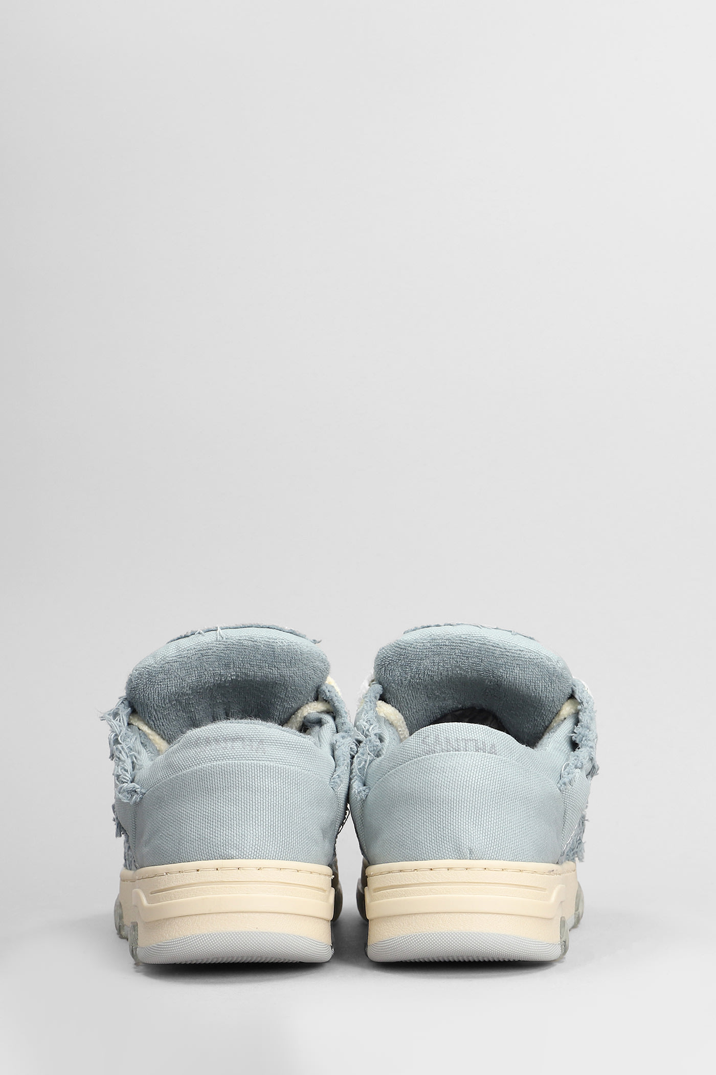 Shop Paura Santha 1 Sneakers In Cyan Canvas