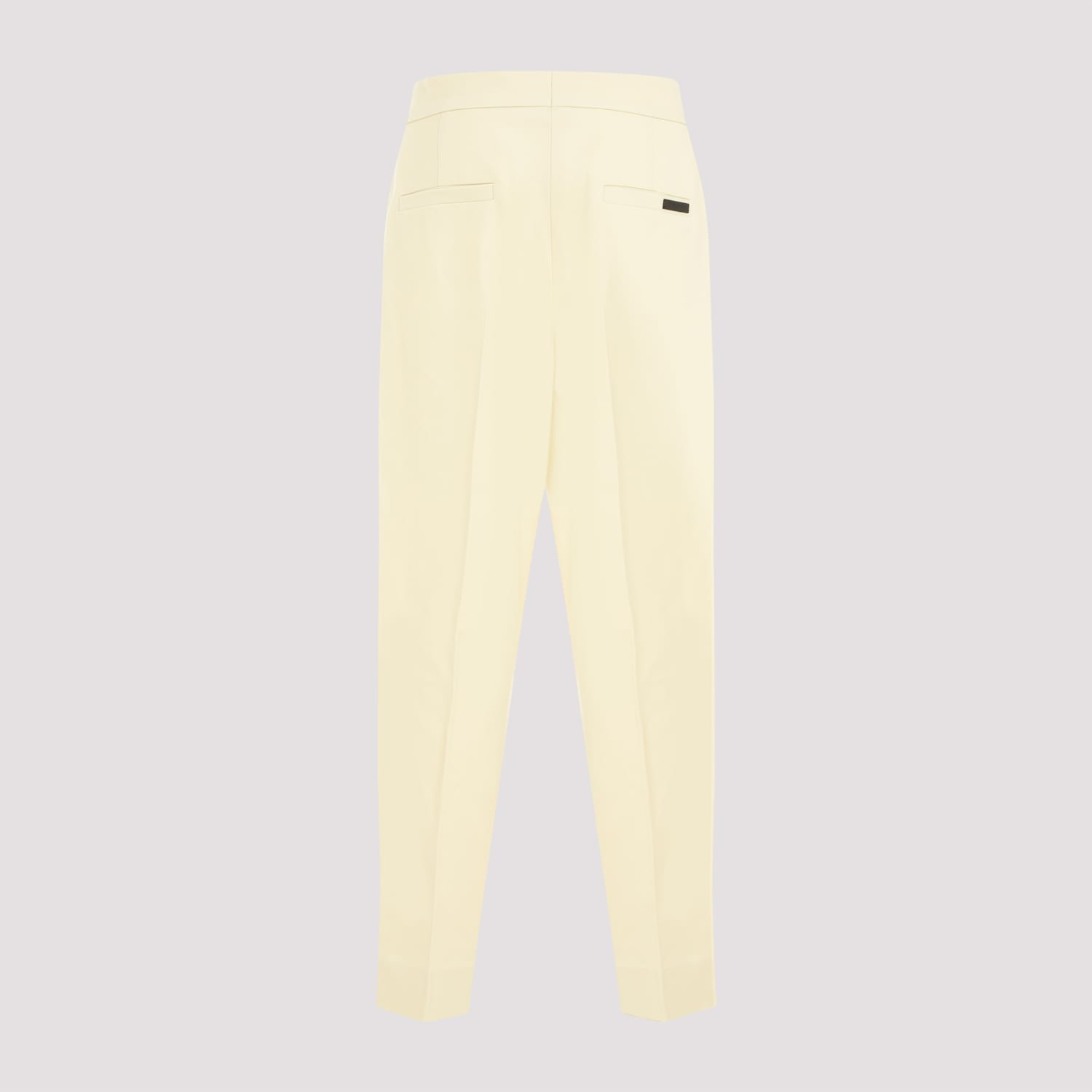 Shop Fear Of God Single Pleat Tapered Trousers In Lemon Cream