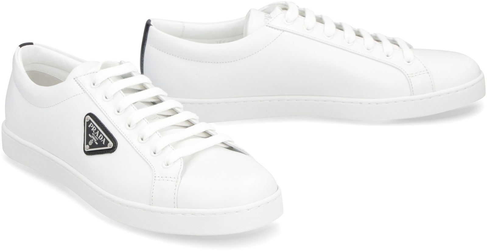 Shop Prada Leather Low-top Sneakers In White