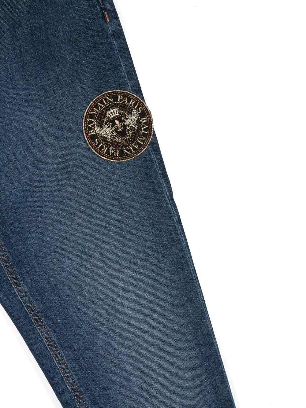Shop Balmain Blue Straight-leg Jeans With Logo Patch In C