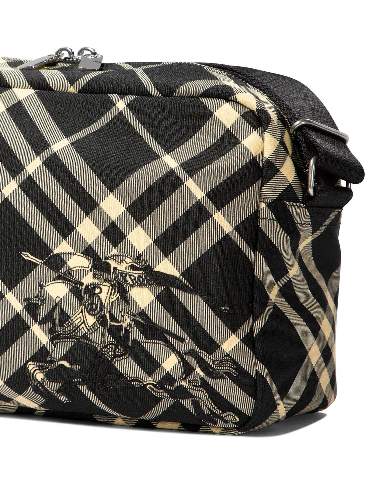 Shop Burberry Equestrian Knight Motif Checked Zipped Crossbody Bag In Black Calico