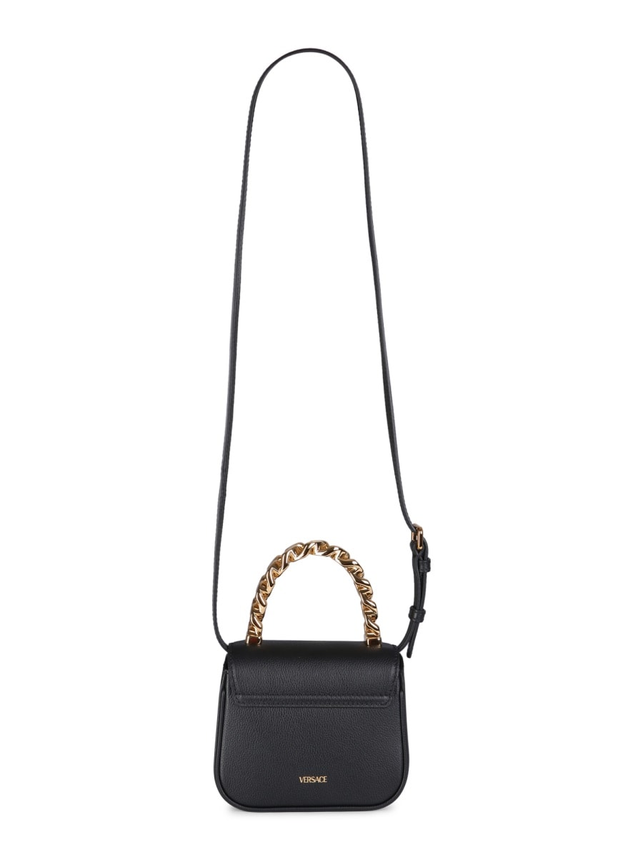 Shop Versace The Jellyfish Mini Bag In Black