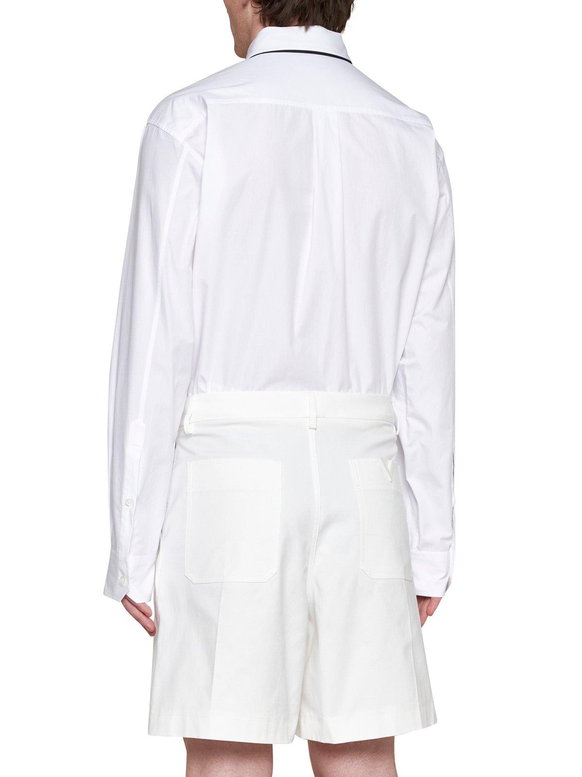 Shop Valentino Logo Plaque Bermuda Shorts In White