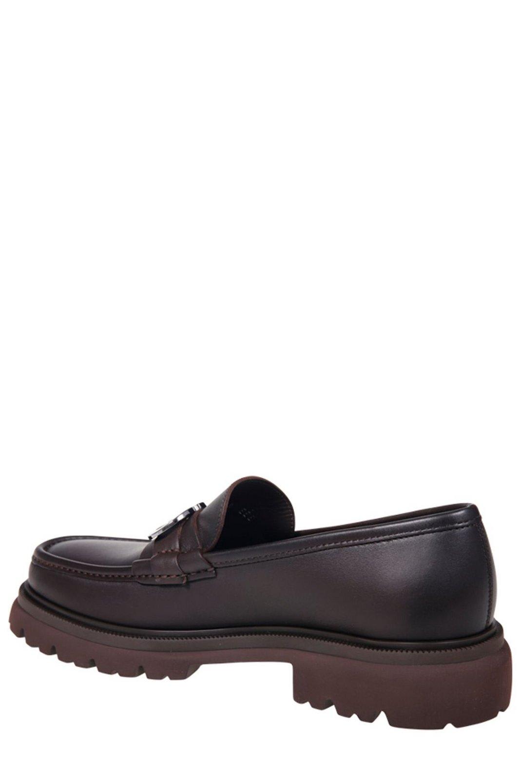 Shop Ferragamo Logo Buckle Loafers