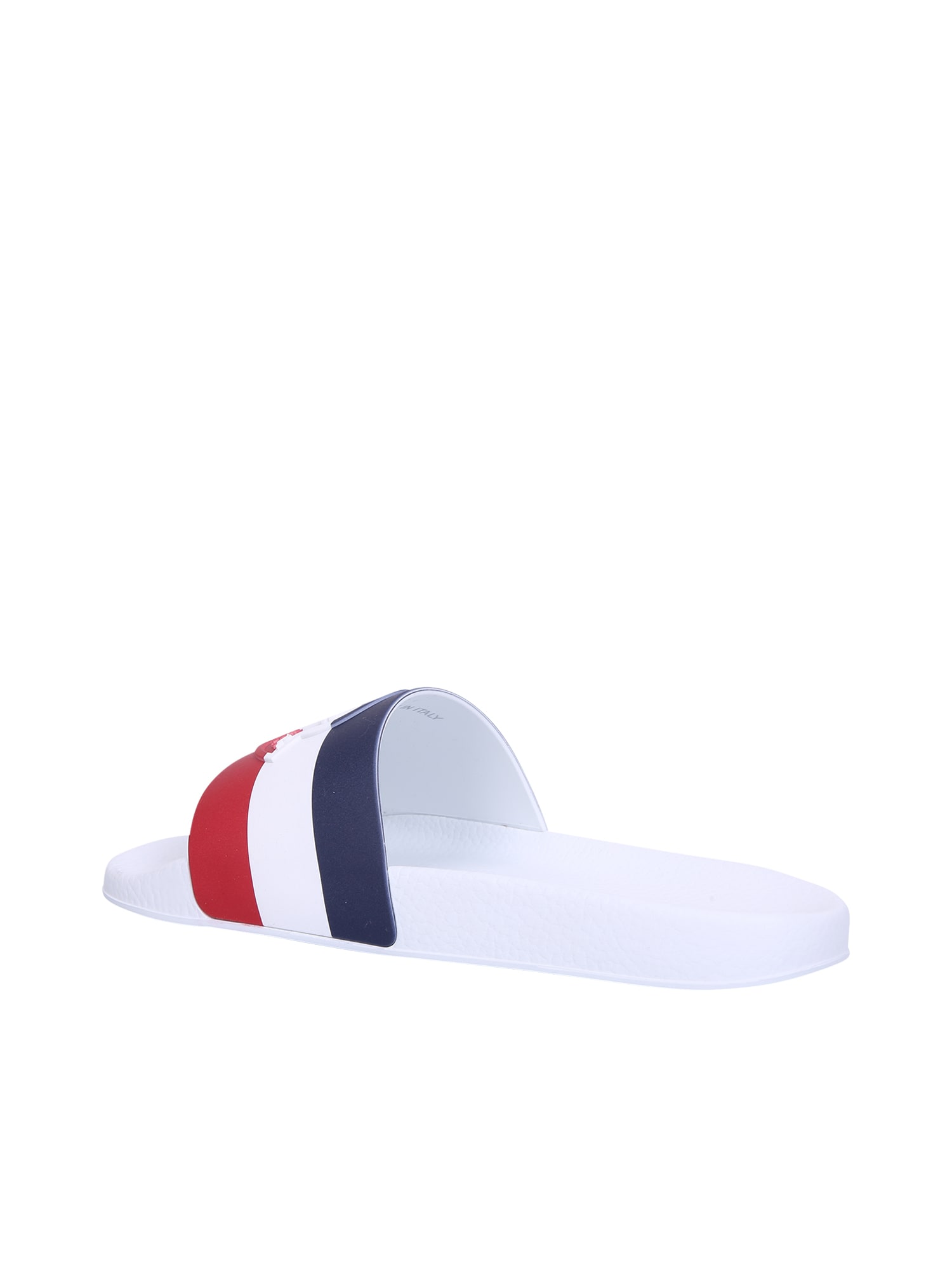 Shop Moncler Striped Embossed-logo Slides In White