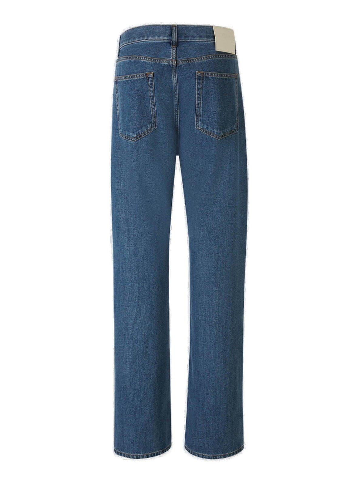 Shop Valentino Logo Patch Straight Leg Jeans