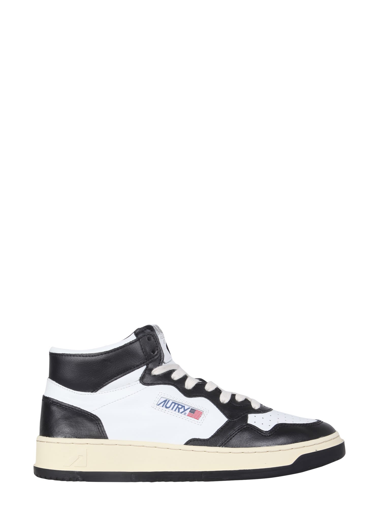Shop Autry Medalist Mid Cut Sneakers In Black/white