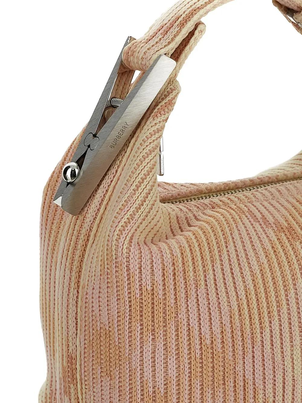 Shop Burberry Mini Peg Duffle Bag In Pink